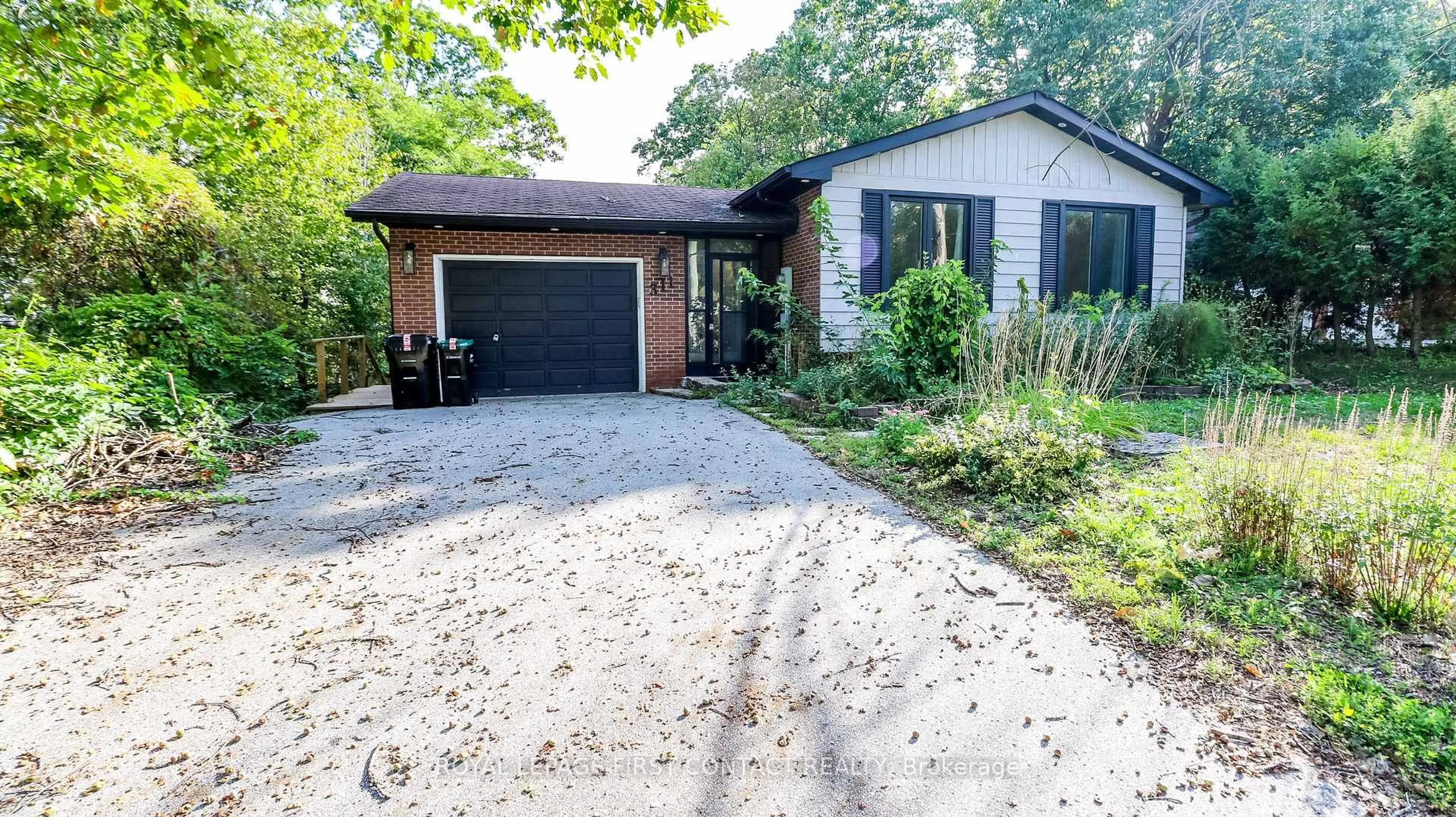 Home with brick exterior material, street for 311 Anne St, Barrie Ontario L4N 5M7
