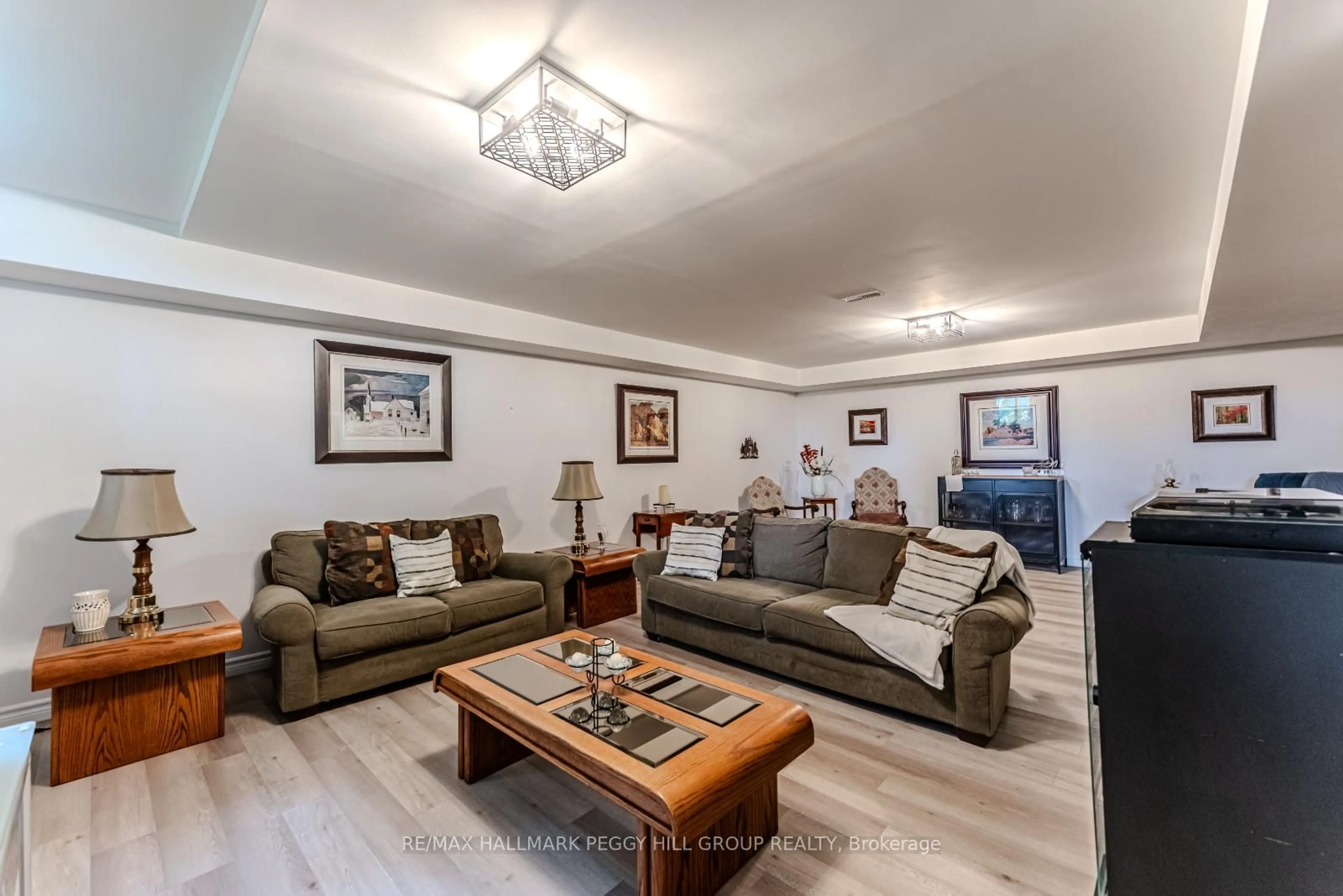 Living room with furniture, unknown for 2946 Hogback Rd, Clearview Ontario L0M 1N0