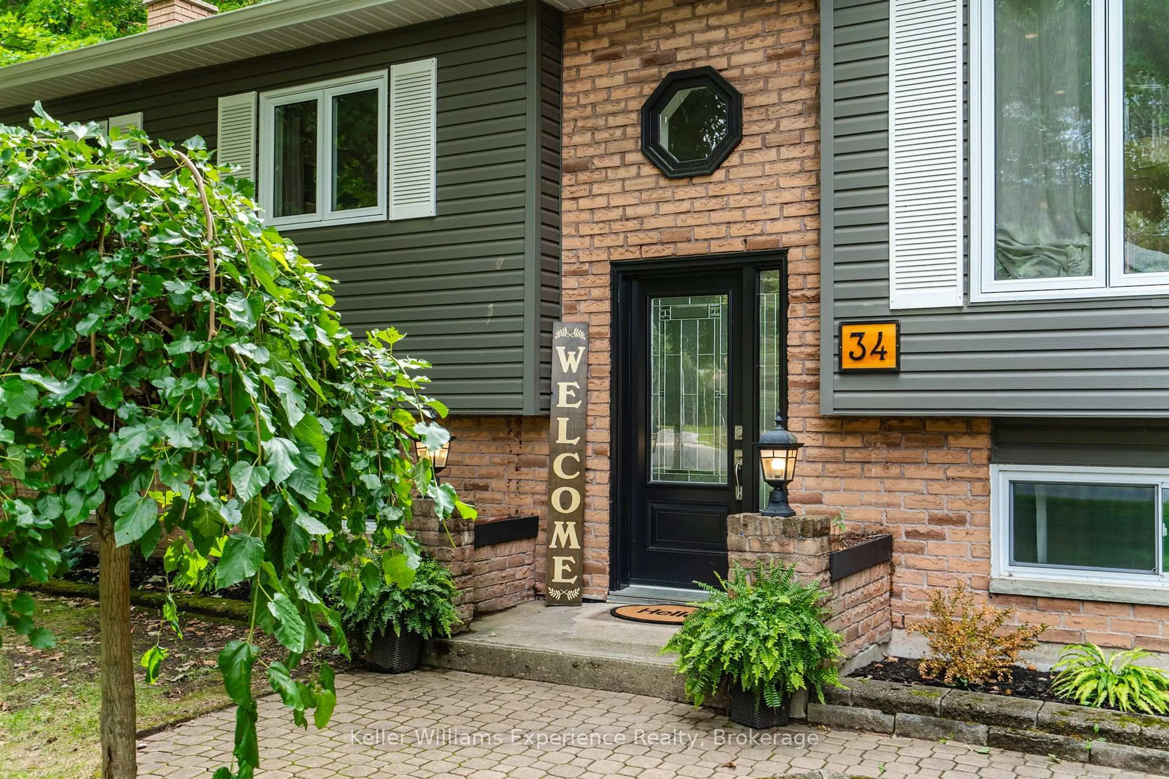 Home with brick exterior material, street for 34 Howard Ave, Tiny Ontario L0L 2T0