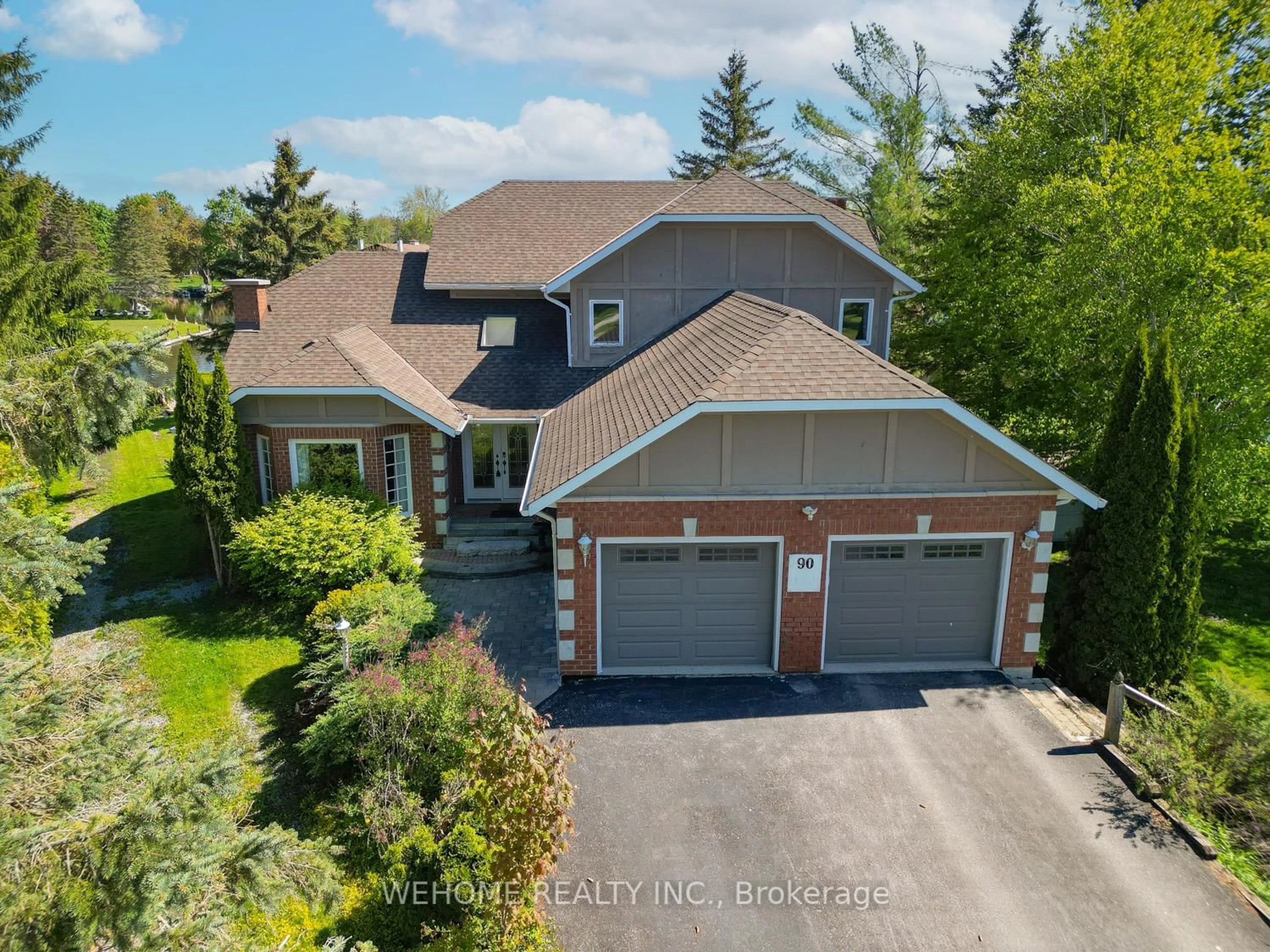 A pic from outside/outdoor area/front of a property/back of a property/a pic from drone, street for 90 Turtle Path, Ramara Ontario L0K 1B0