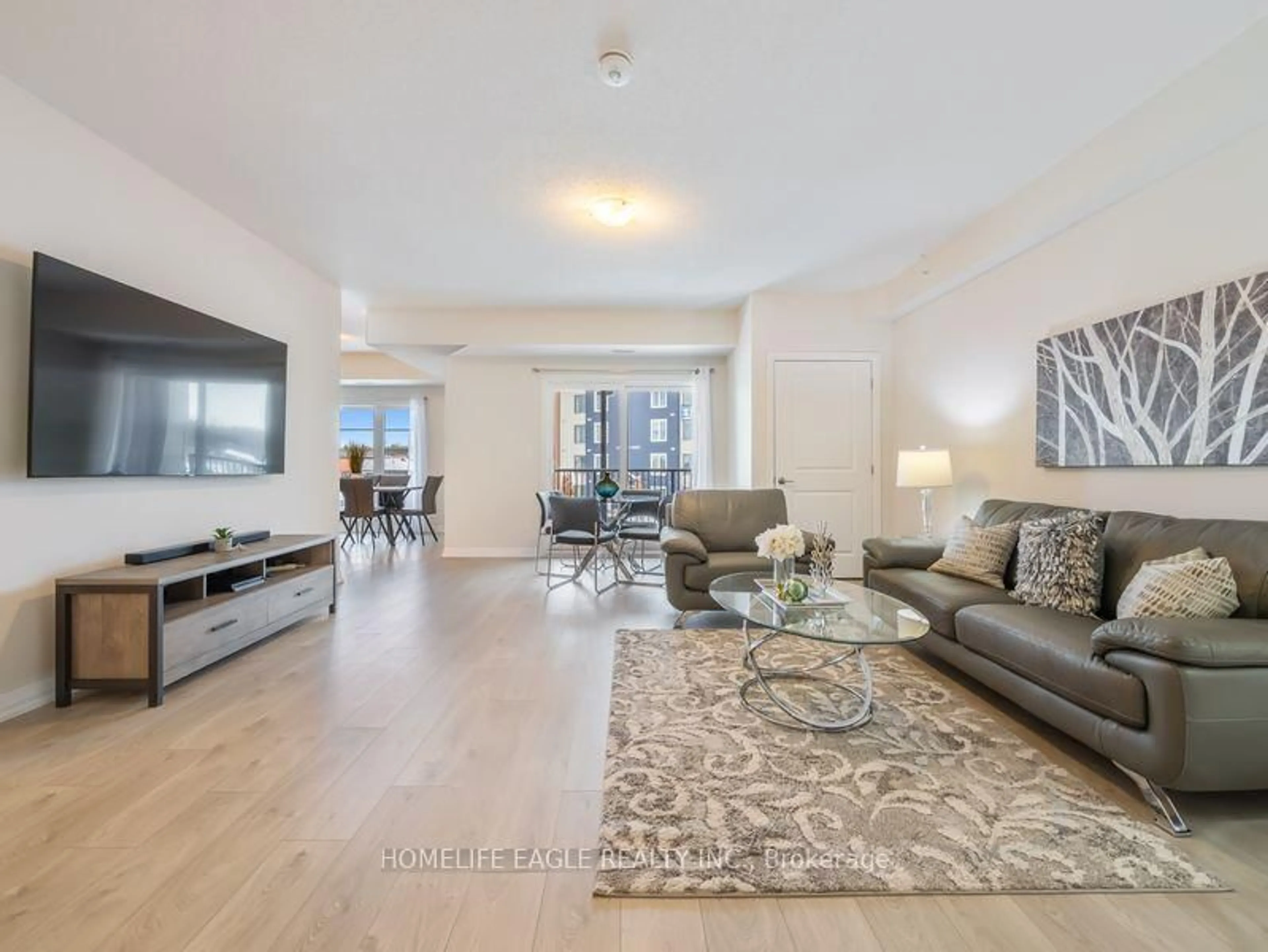 Living room with furniture, unknown for 20 Koda St #211, Barrie Ontario L9J 0J7