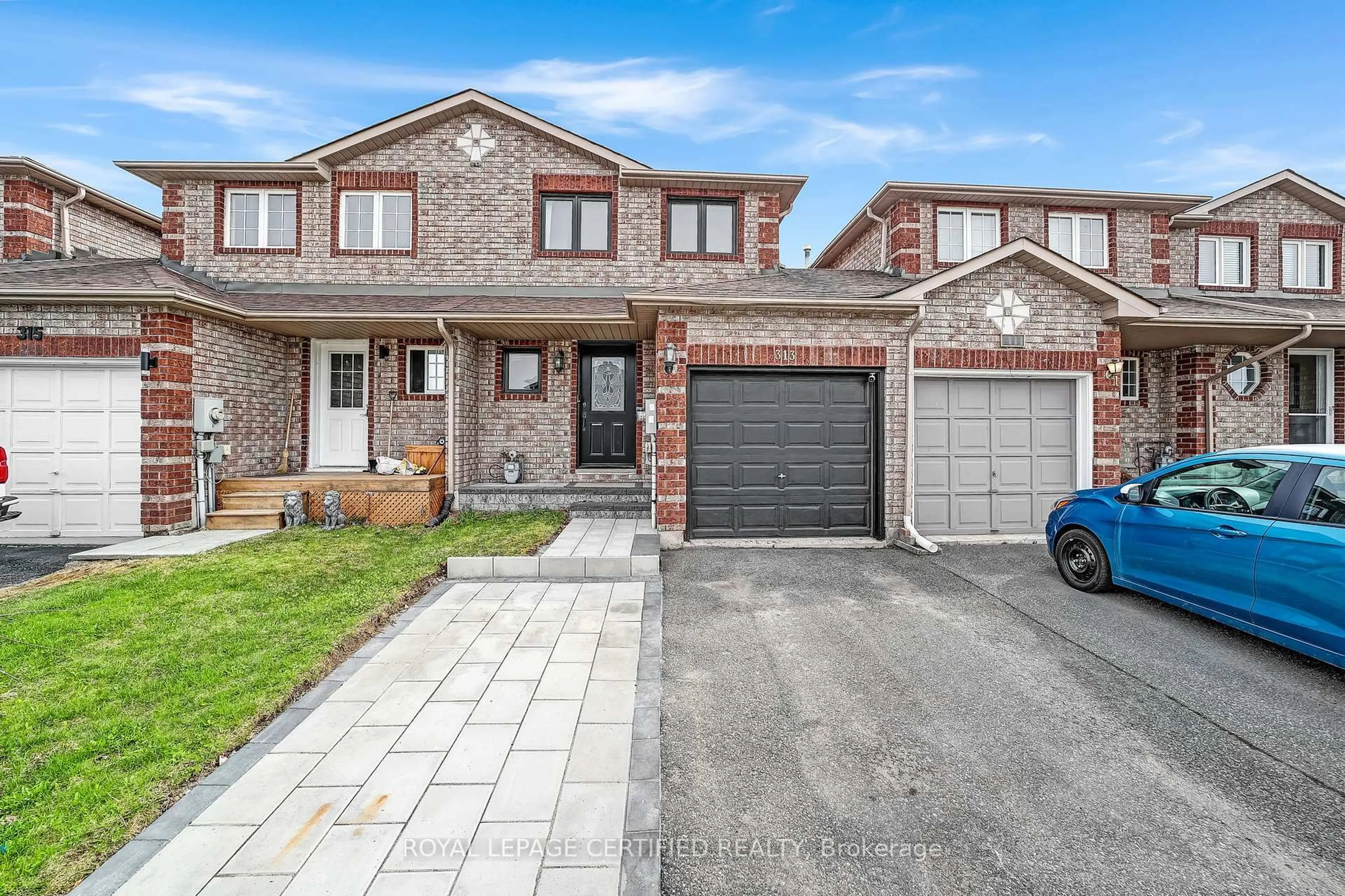 Home with brick exterior material, street for 313 Dunsmore Lane, Barrie Ontario L4M 7A8