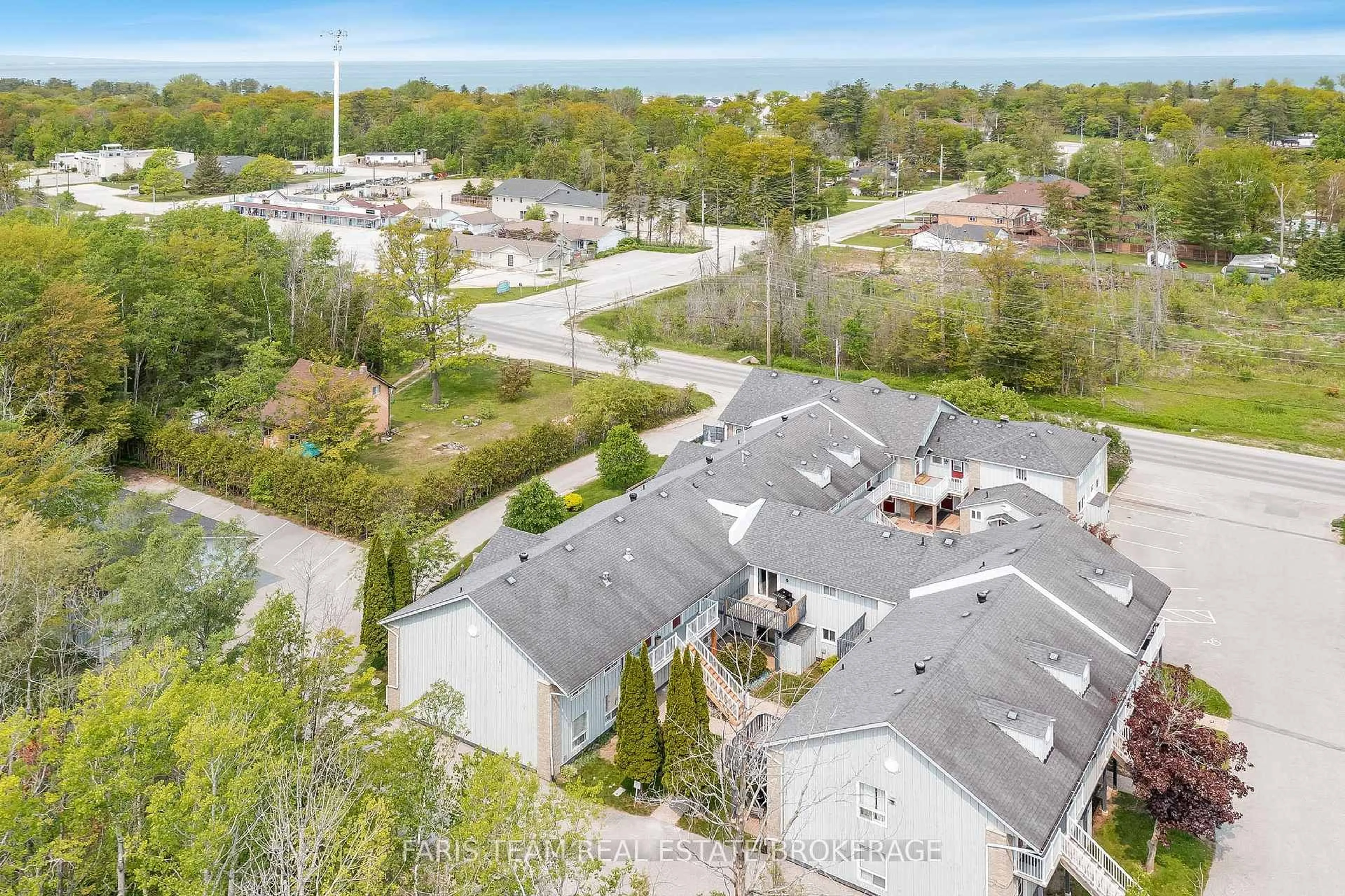 A pic from outside/outdoor area/front of a property/back of a property/a pic from drone, unknown for 891 River Rd #5, Wasaga Beach Ontario L9Z 2K7
