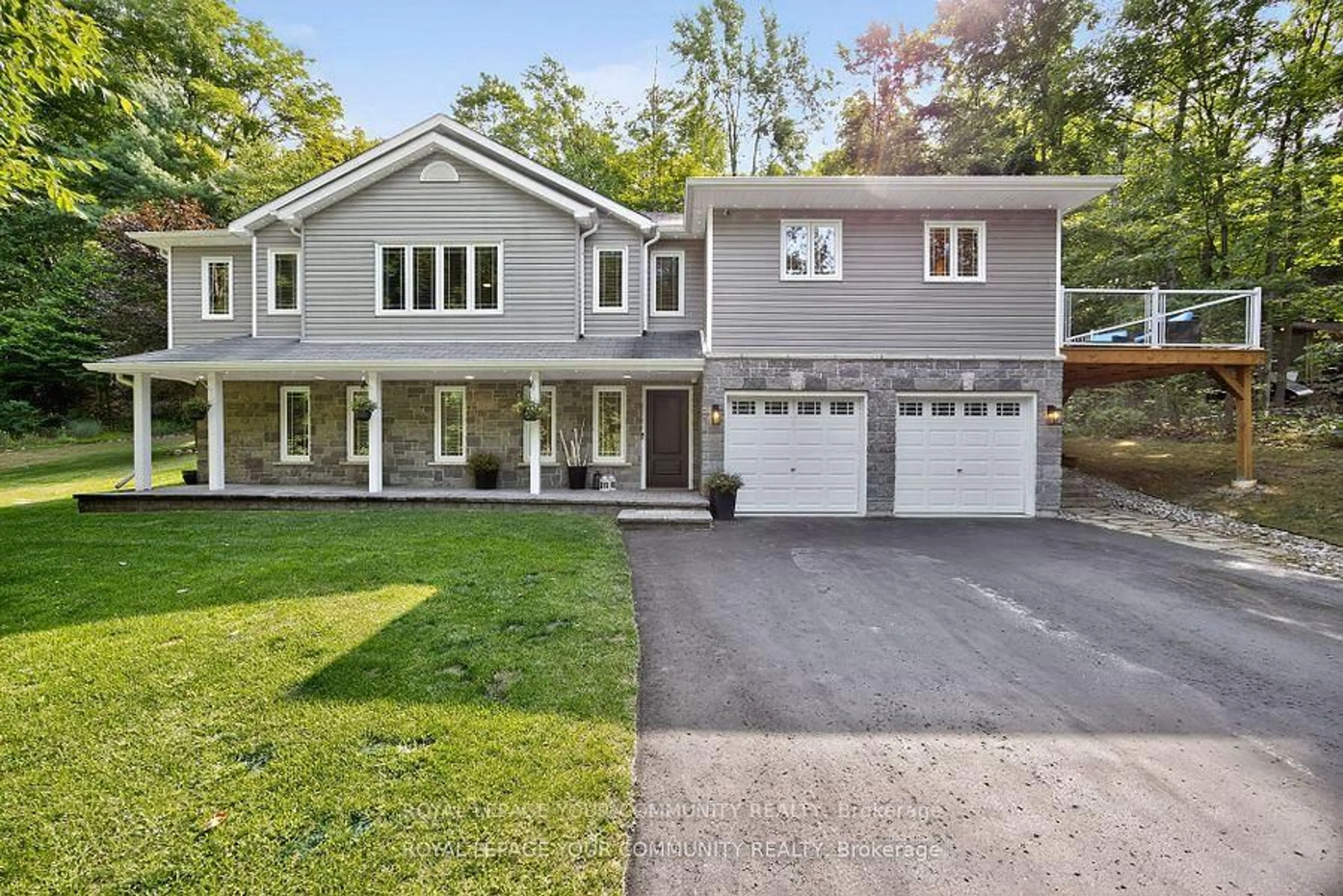 Home with vinyl exterior material, street for 135 Huronwoods Dr, Oro-Medonte Ontario L0K 1E0