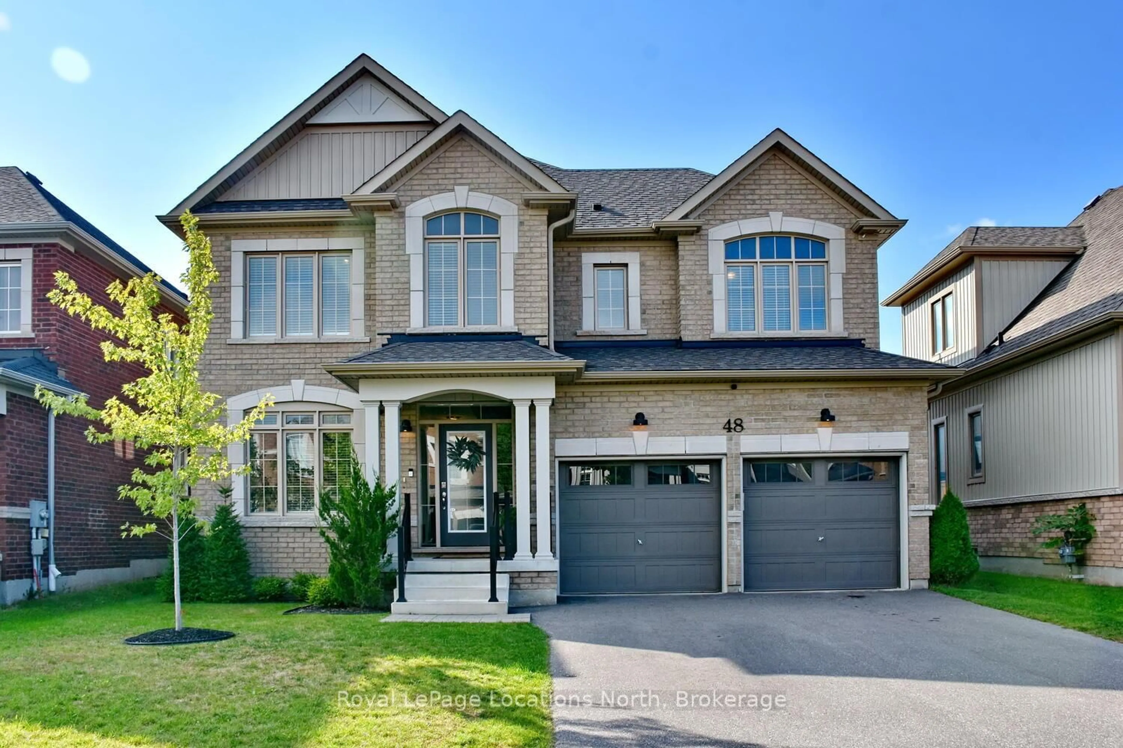 Home with brick exterior material, street for 48 Mclean Ave, Collingwood Ontario L9Y 3Z6