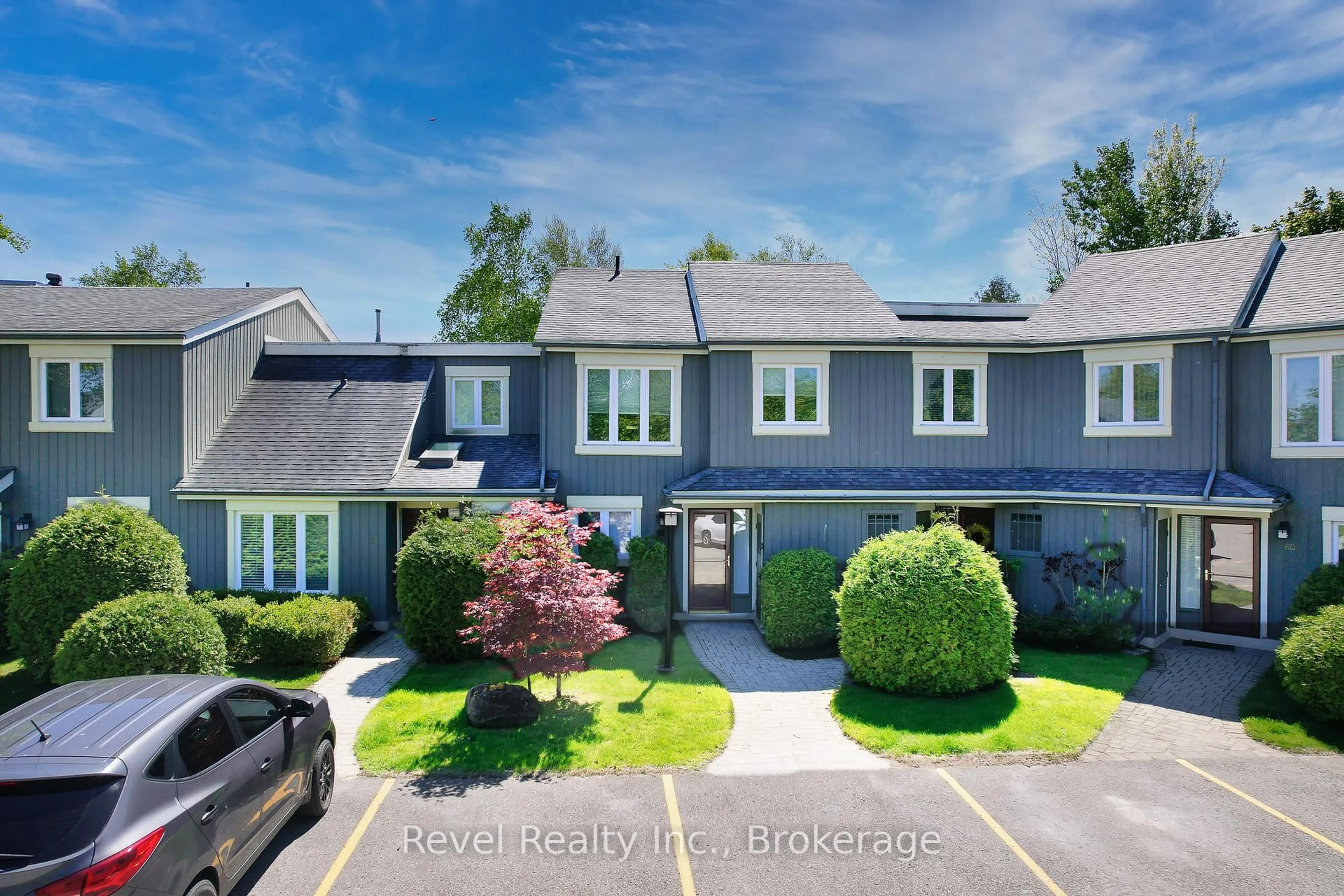A pic from outside/outdoor area/front of a property/back of a property/a pic from drone, street for 145 Fairway Cres #58, Collingwood Ontario L9Y 5B4