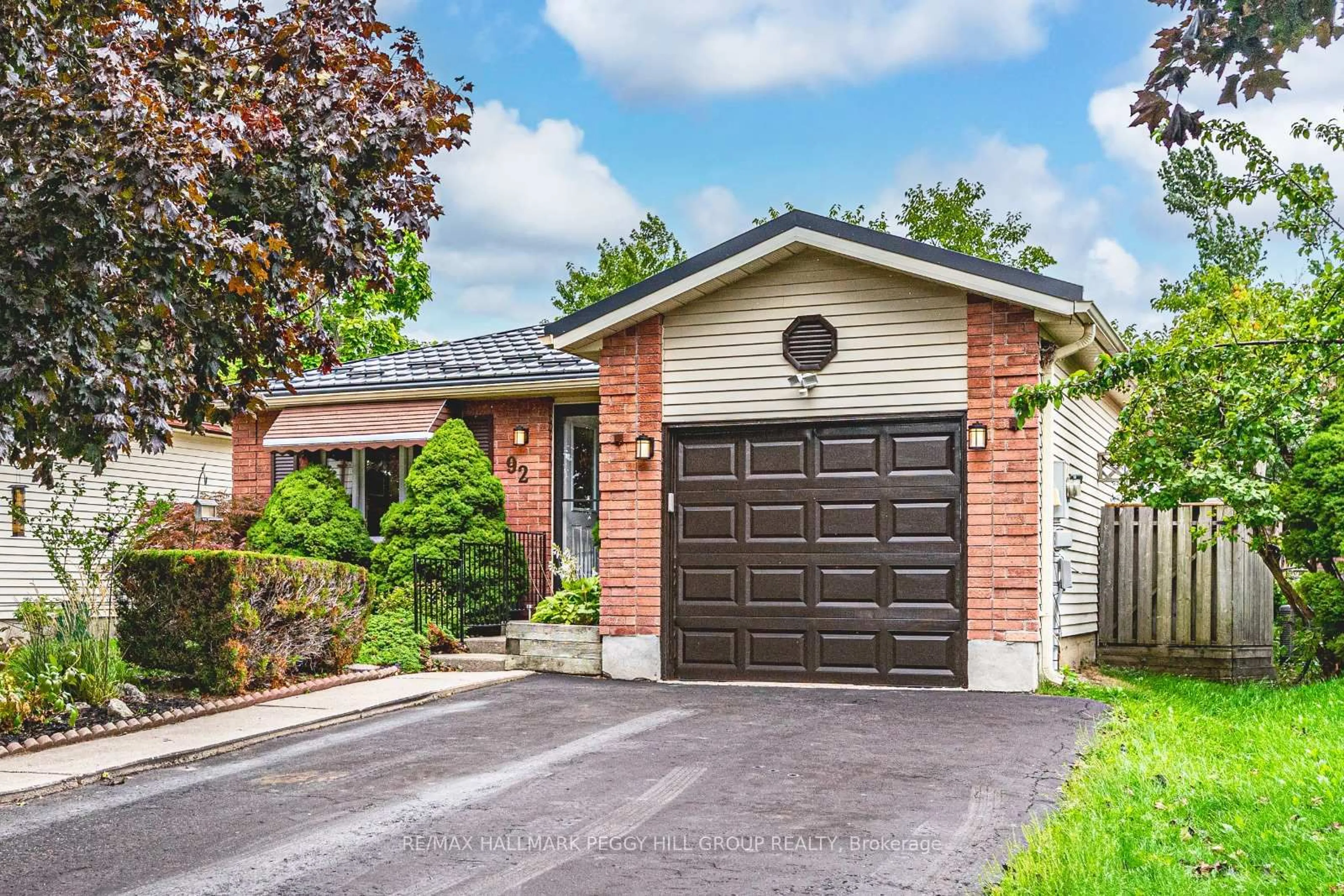 Home with brick exterior material, street for 92 Hickling Tr, Barrie Ontario L4M 5T3