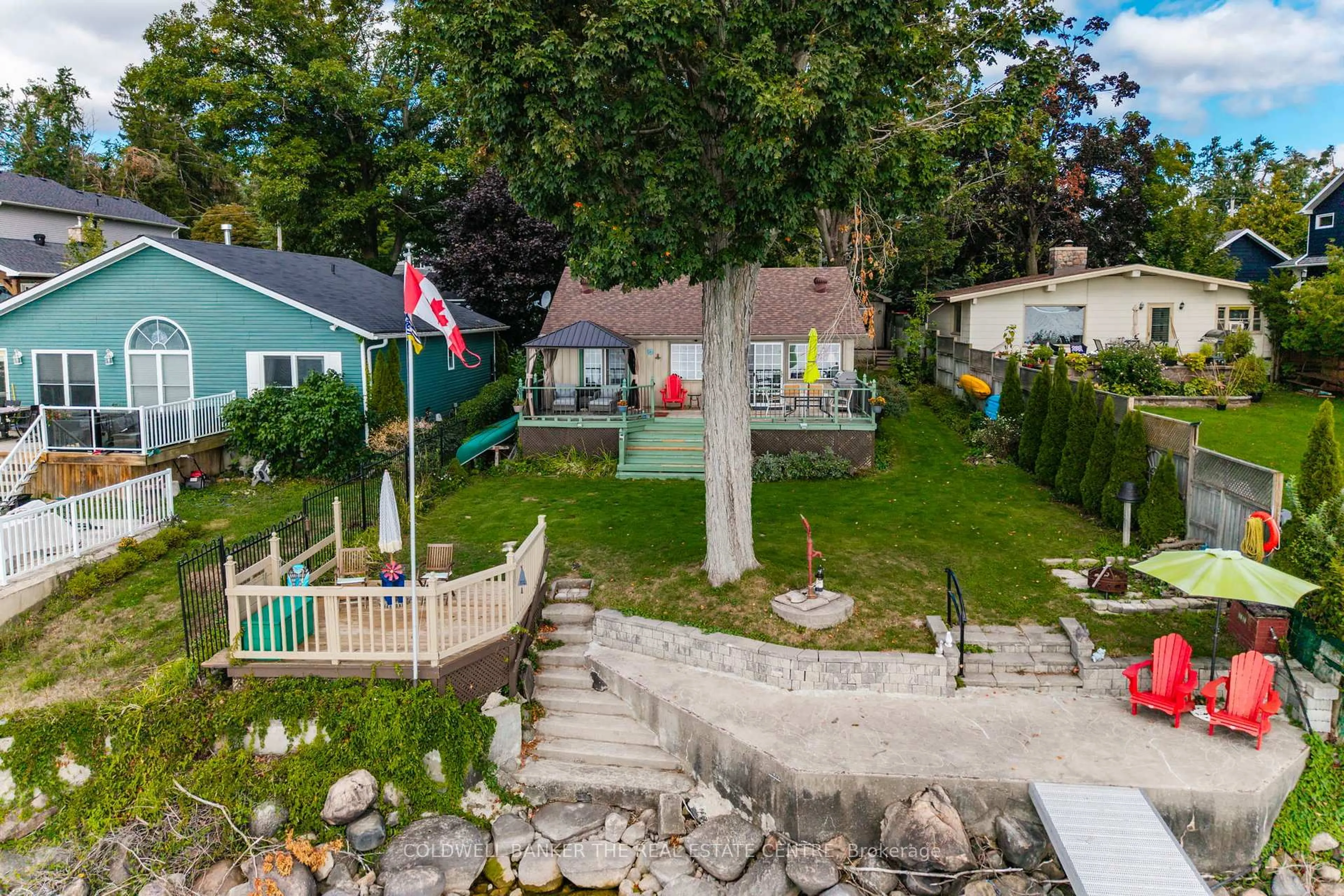 A pic from outside/outdoor area/front of a property/back of a property/a pic from drone, street for 115 Lakeshore Rd, Oro-Medonte Ontario L0L 2E0