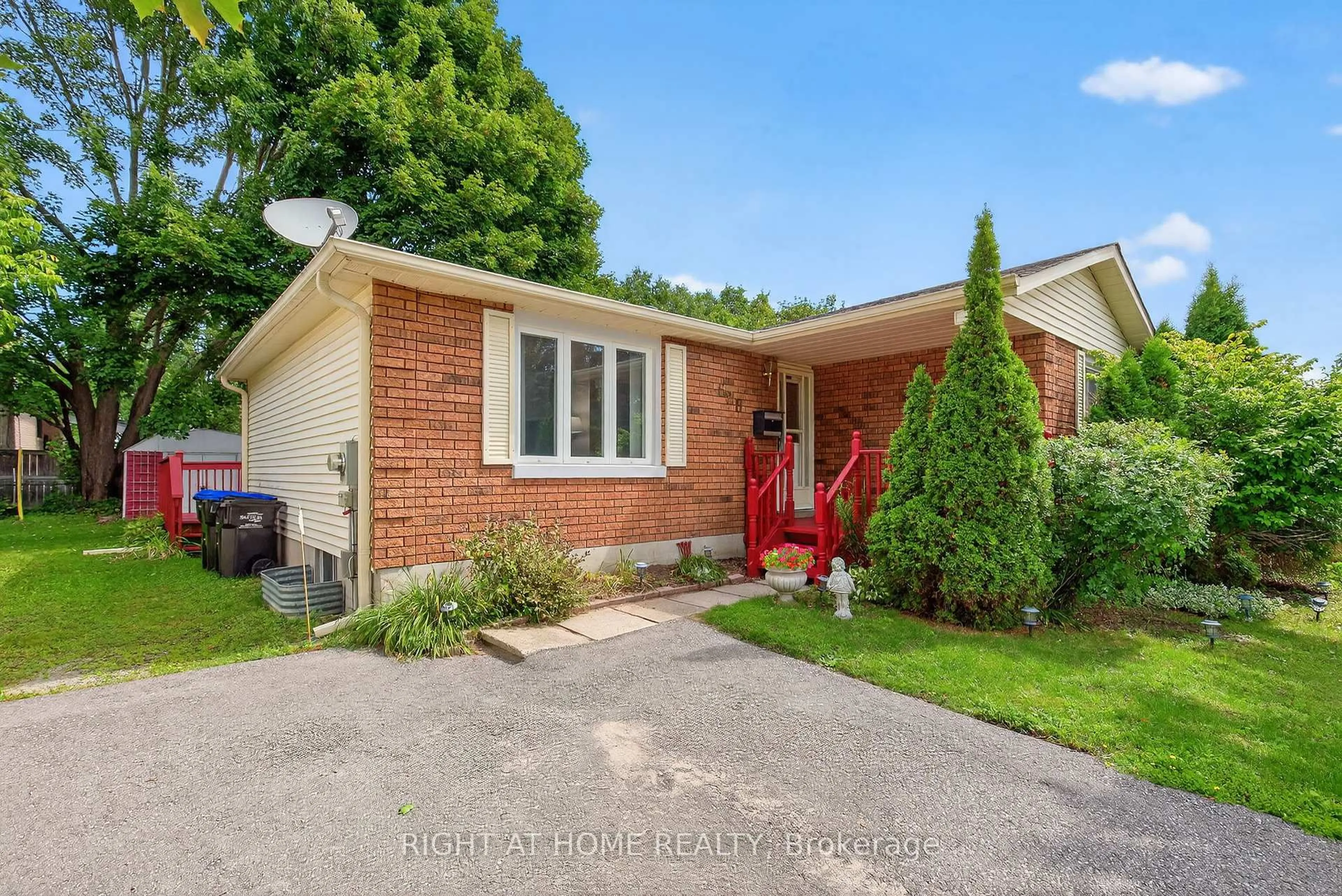 Home with brick exterior material, street for 688 Bayview Dr, Midland Ontario L4R 1W8