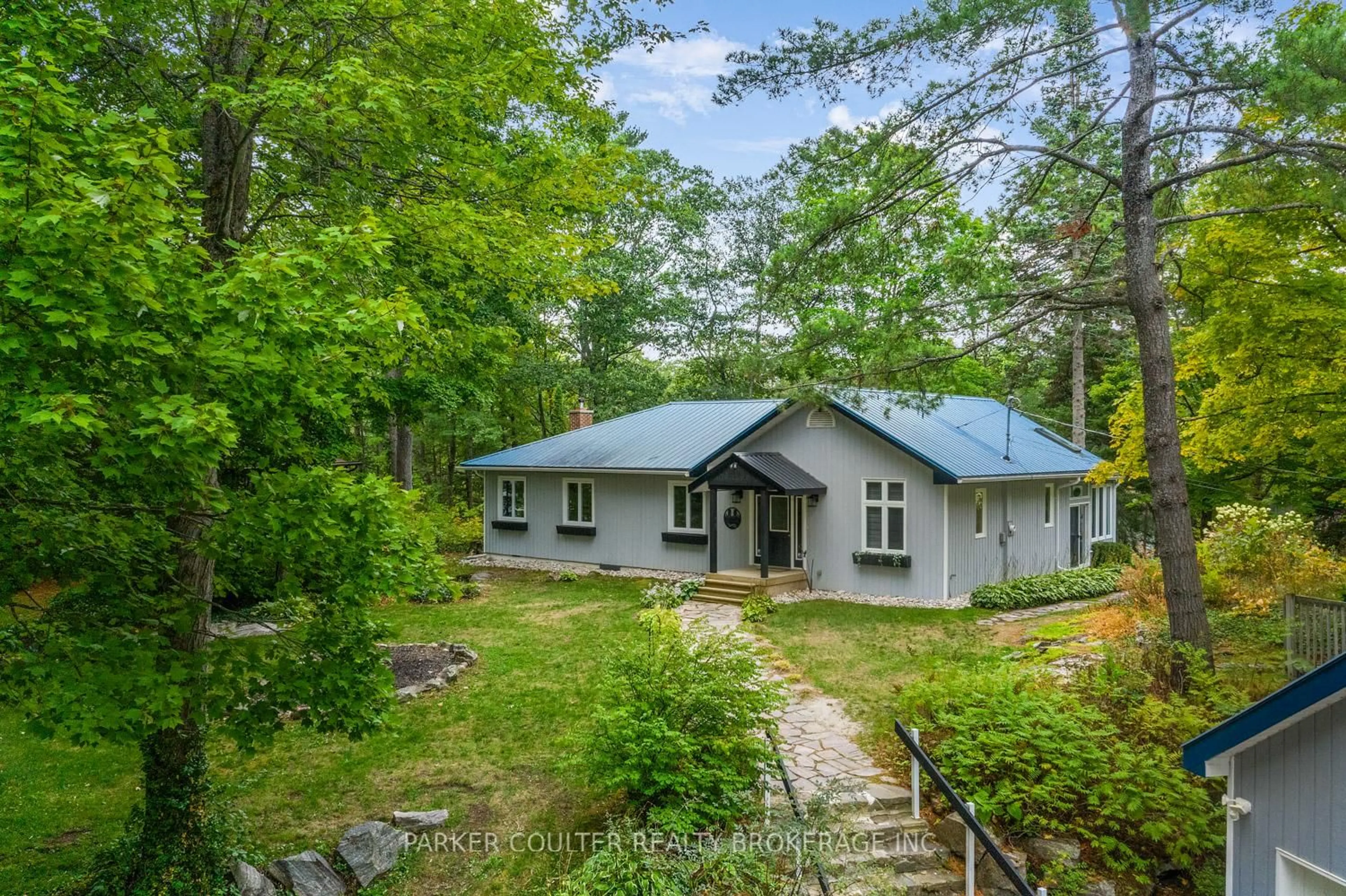 A pic from outside/outdoor area/front of a property/back of a property/a pic from drone, forest/trees view for 3183 Green River Dr, Severn Ontario L0K 2B0