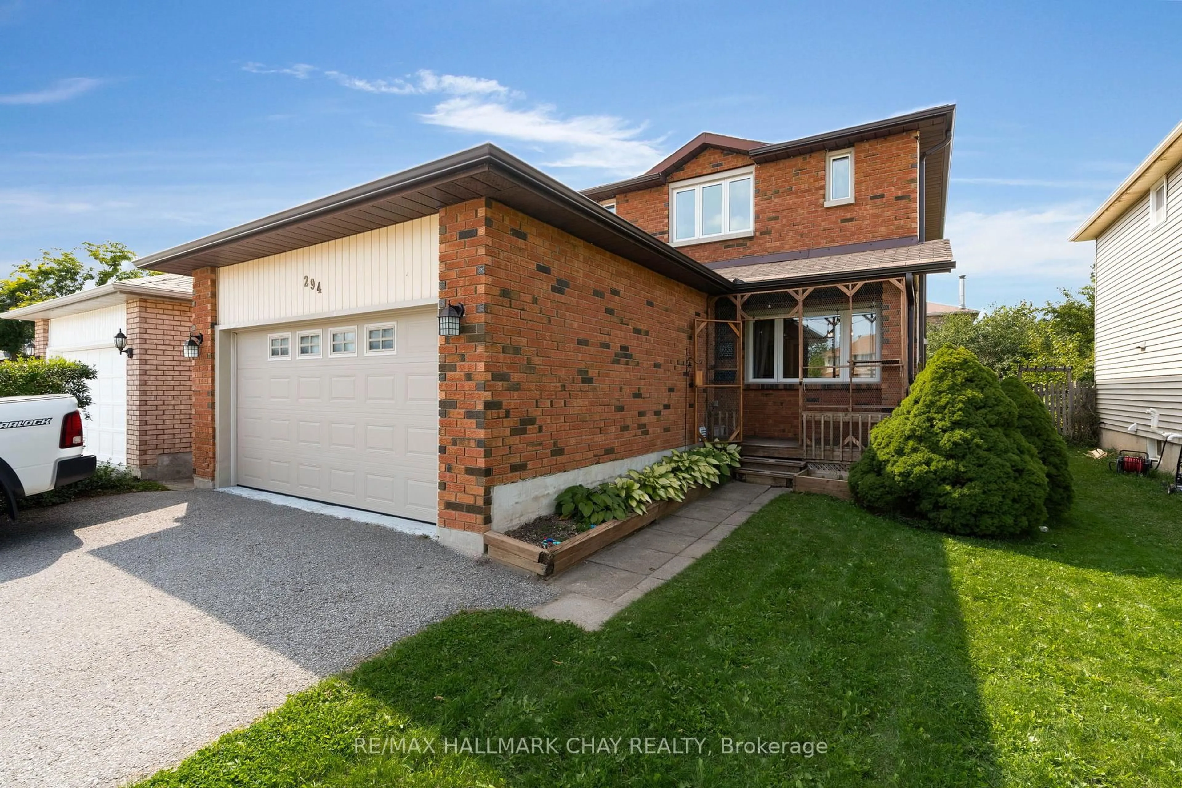 Home with brick exterior material, street for 294 Hickling Tr, Barrie Ontario L4M 5X9