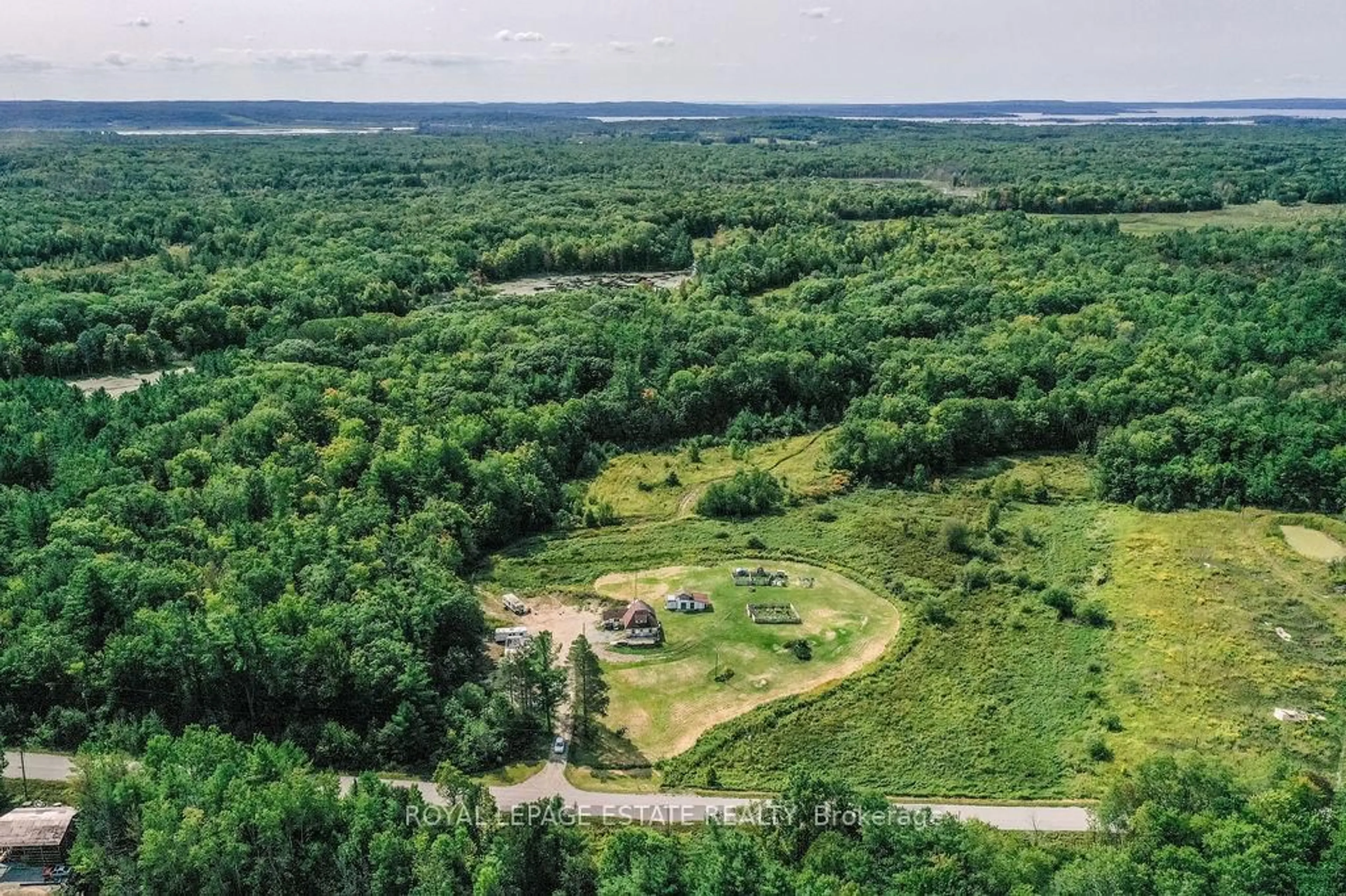 A pic from outside/outdoor area/front of a property/back of a property/a pic from drone, forest/trees view for 2488 Irish Line, Severn Ontario L0K 1E0