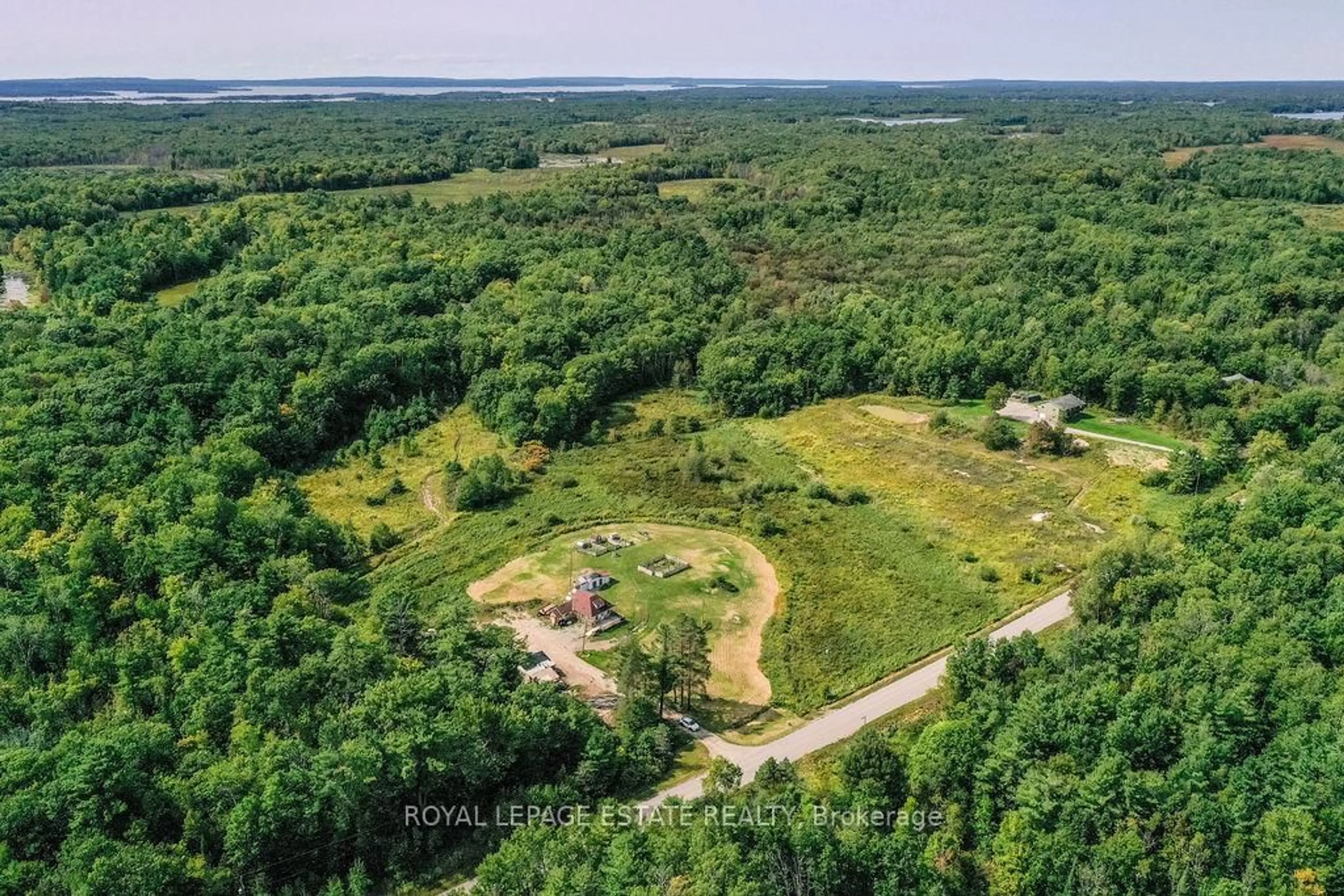 A pic from outside/outdoor area/front of a property/back of a property/a pic from drone, forest/trees view for 2488 Irish Line, Severn Ontario L0K 1E0