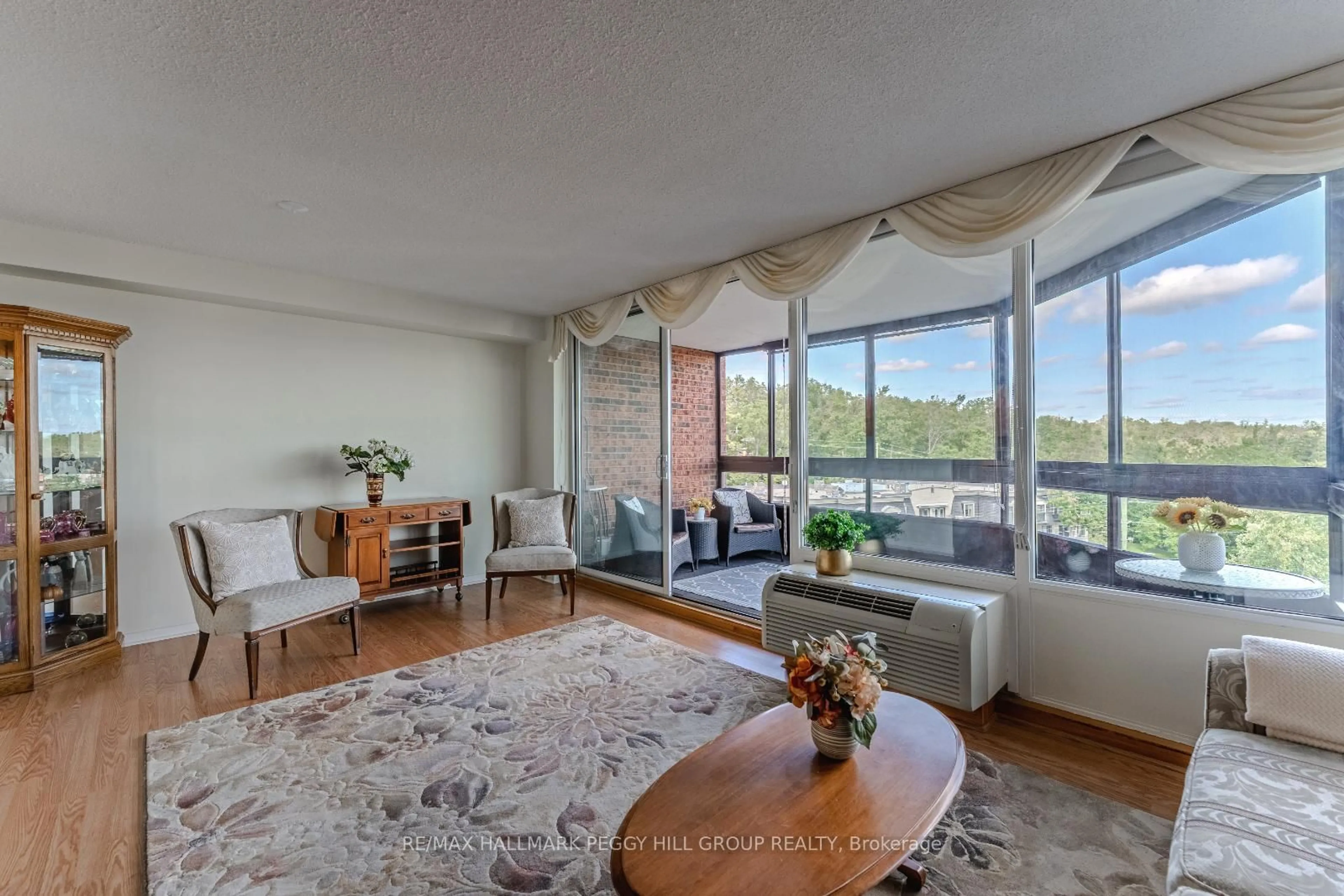 Living room with furniture, unknown for 181 Collier St #803, Barrie Ontario L4M 5L6
