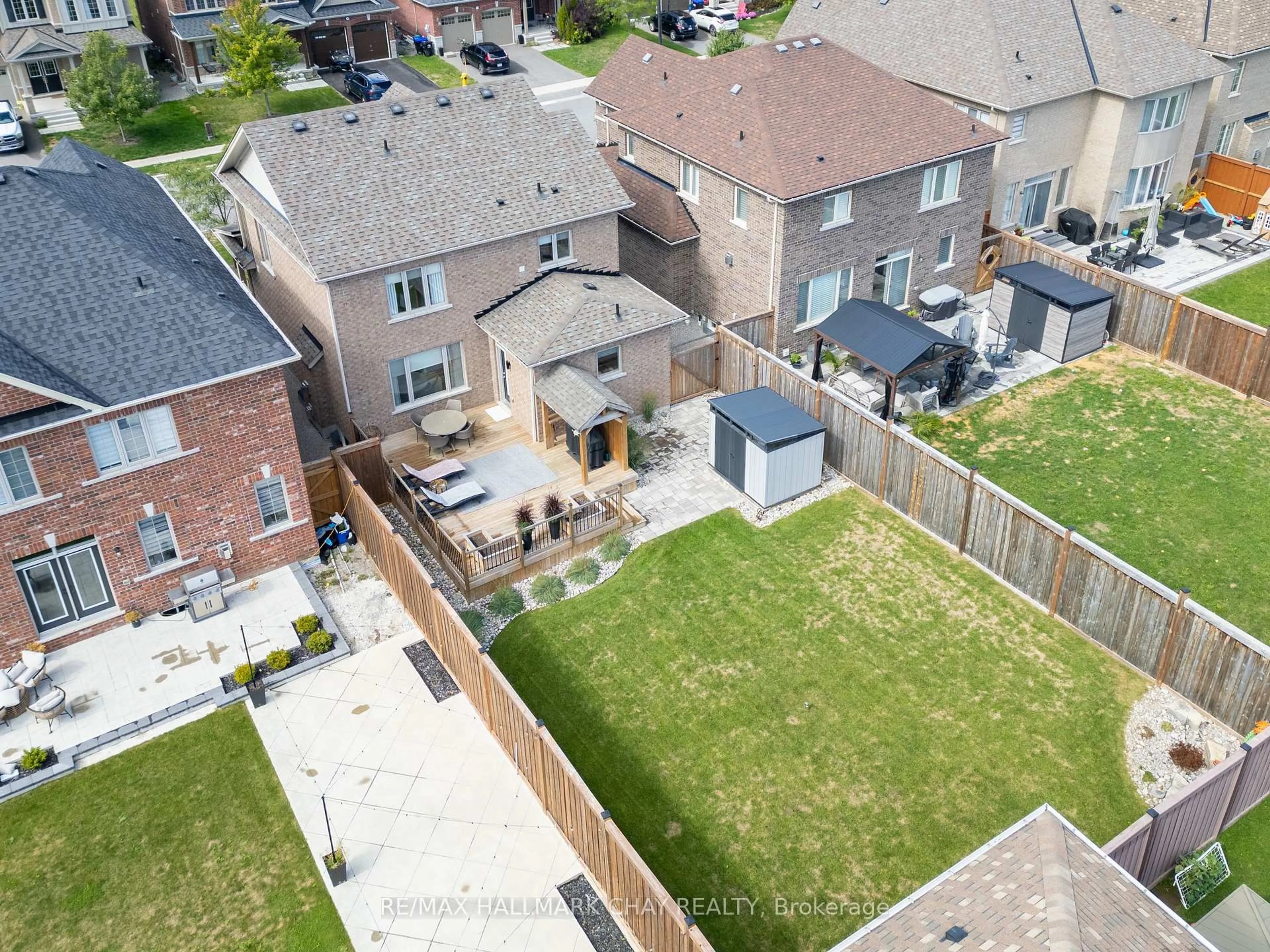 A pic from outside/outdoor area/front of a property/back of a property/a pic from drone, street for 38 Rugman Cres, Springwater Ontario L9X 2A2