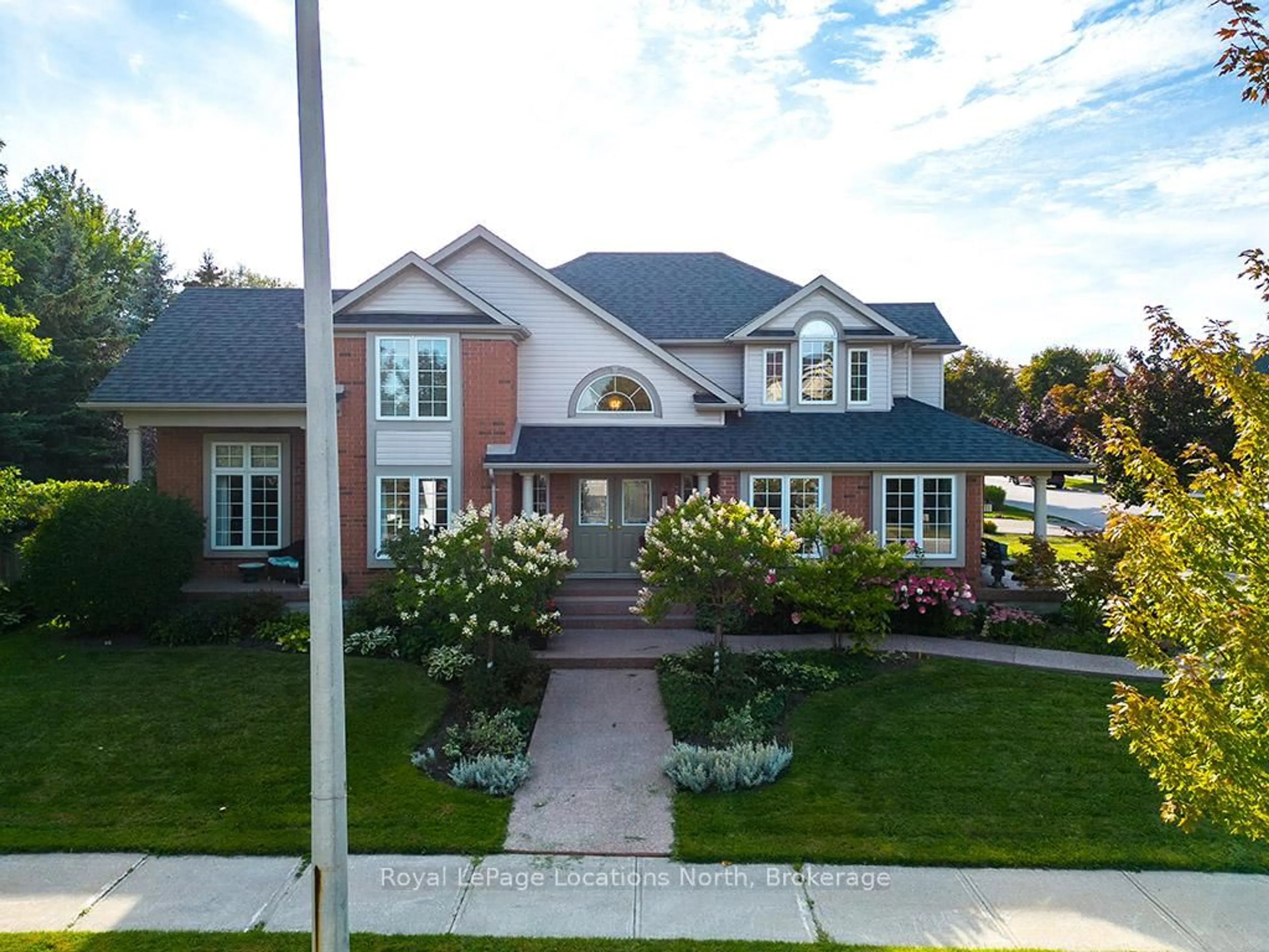 Home with brick exterior material, street for 12 Georgian Meadows Dr, Collingwood Ontario L9Y 5G9