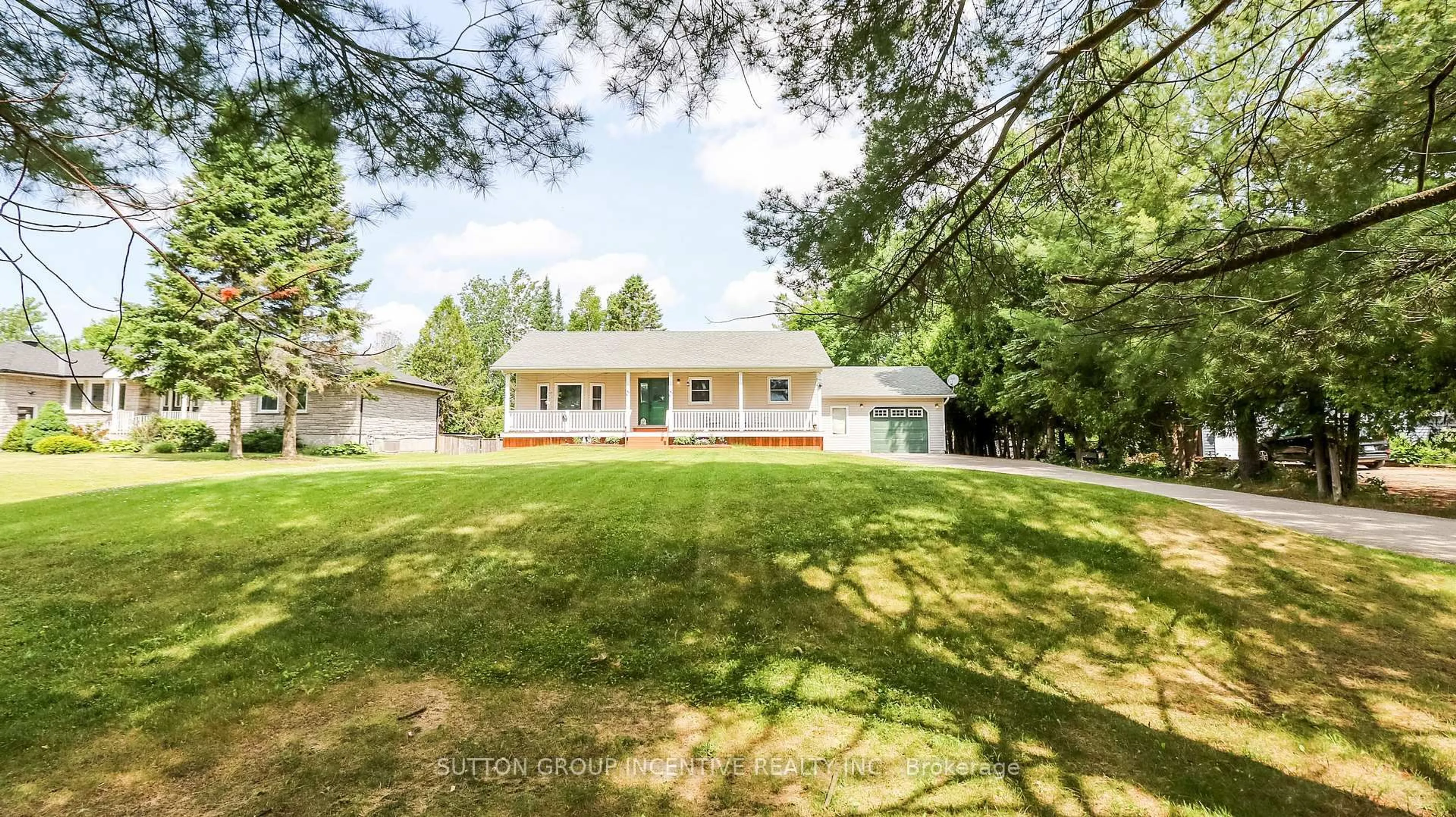 A pic from outside/outdoor area/front of a property/back of a property/a pic from drone, unknown for 54 Mill St, Springwater Ontario L0L 1V0
