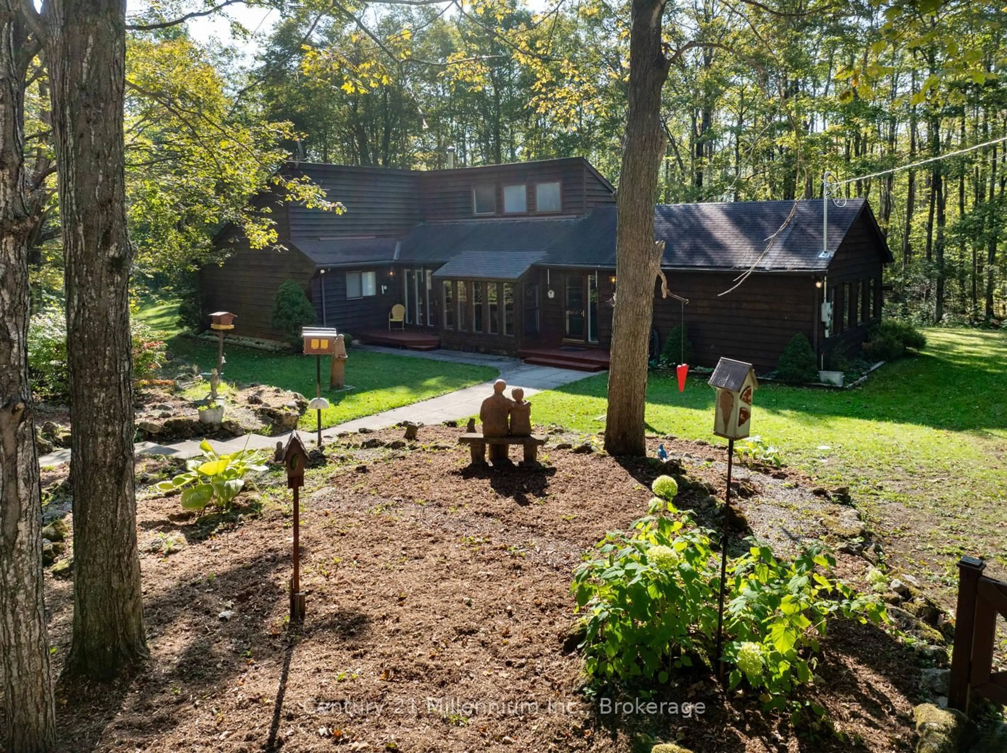 A pic from outside/outdoor area/front of a property/back of a property/a pic from drone, forest/trees view for 1415 County Rd 124 Rd, Clearview Ontario L0M 1H0