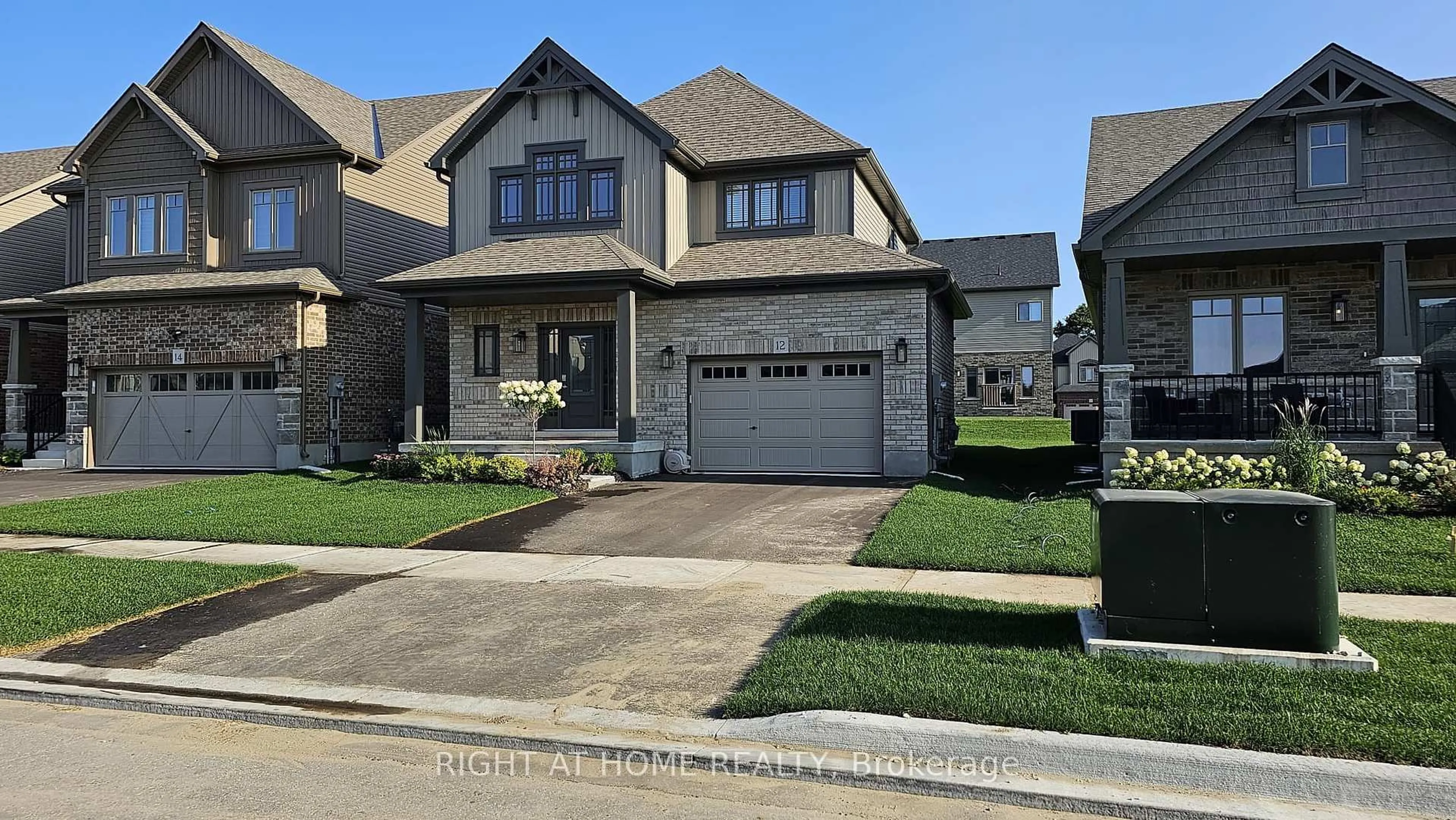 Home with brick exterior material, street for 12 Mitchell Ave, Collingwood Ontario L9Y 5M3
