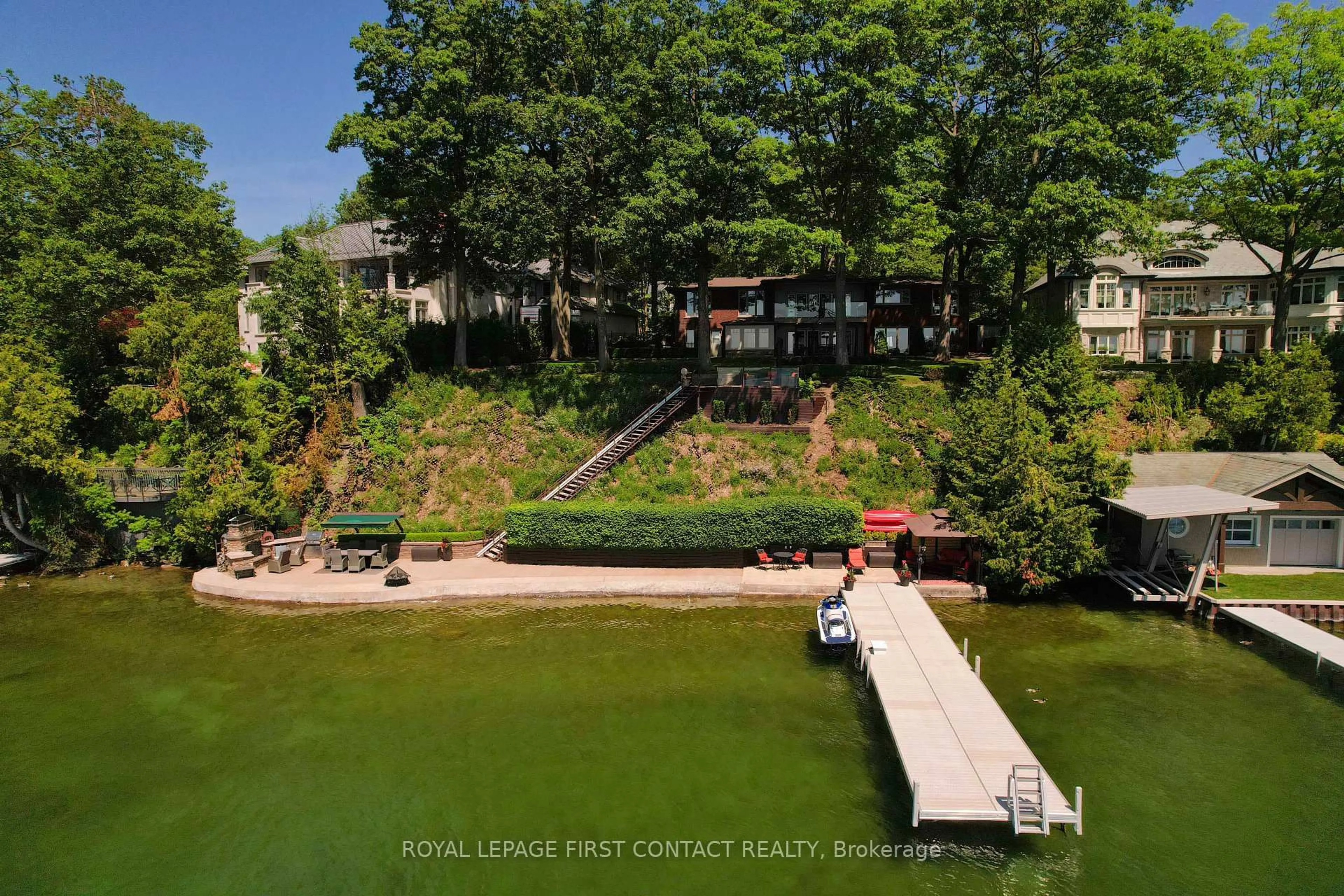 A pic from outside/outdoor area/front of a property/back of a property/a pic from drone, water/lake/river/ocean view for 13 Georgina Dr, Oro-Medonte Ontario L4M 1E9