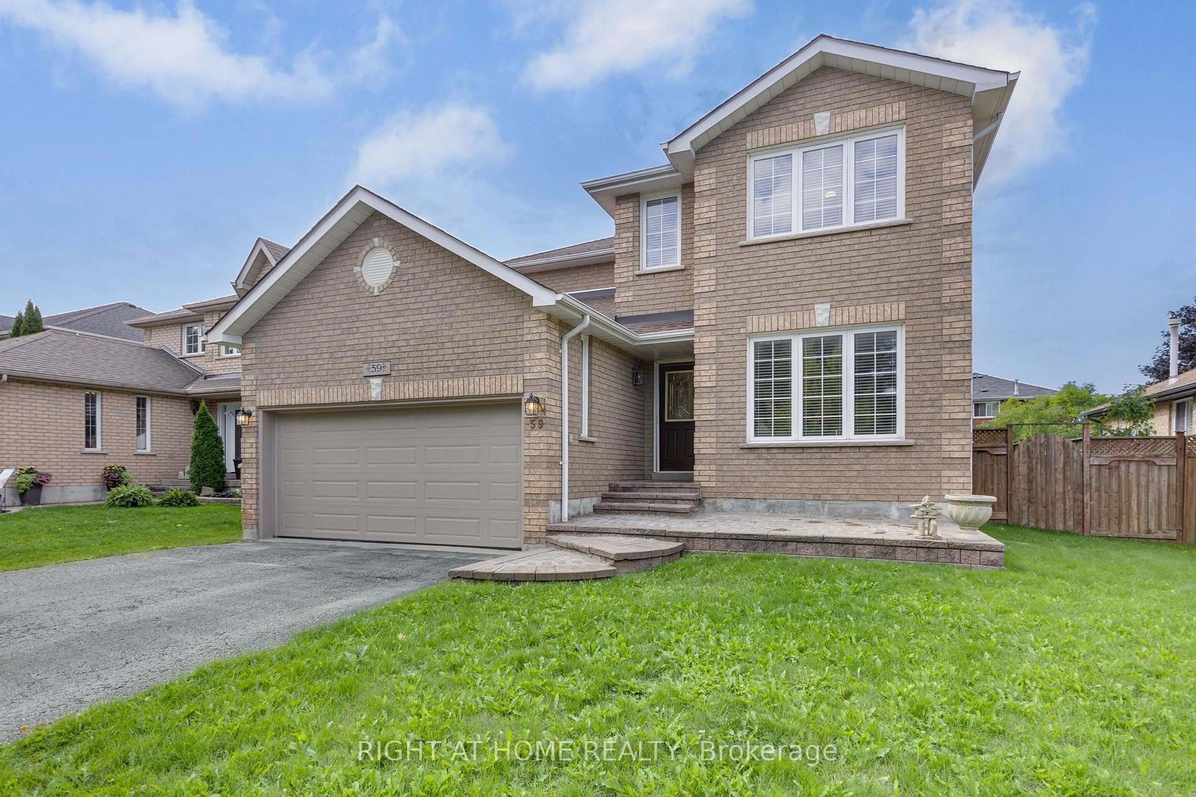 Home with brick exterior material, street for 59 Kingsridge Rd, Barrie Ontario L4N 8V2