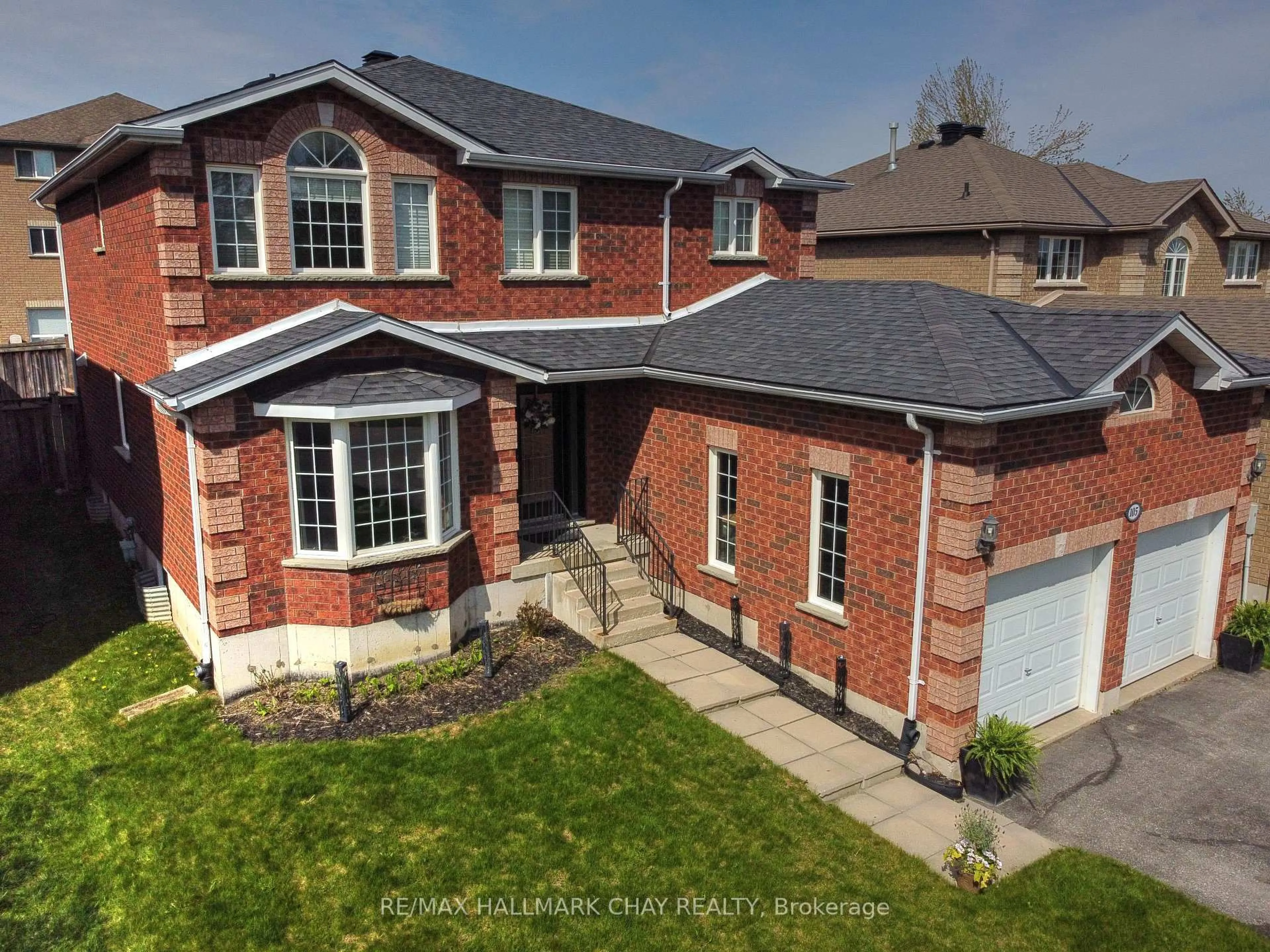 Home with brick exterior material, street for 105 Crompton Dr, Barrie Ontario L4M 6N9