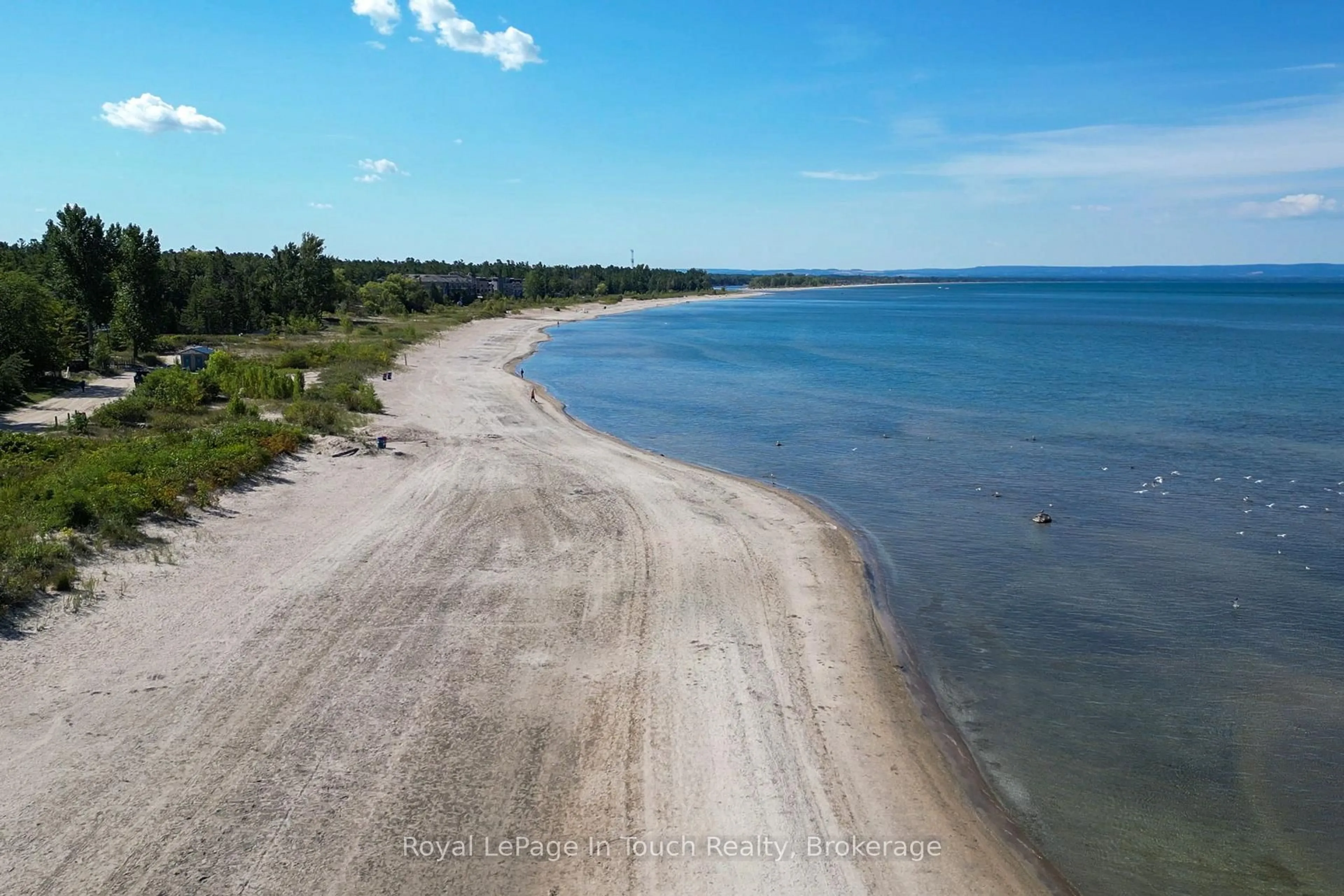 A pic from outside/outdoor area/front of a property/back of a property/a pic from drone, water/lake/river/ocean view for 944 River Rd, Wasaga Beach Ontario L9Z 2P3