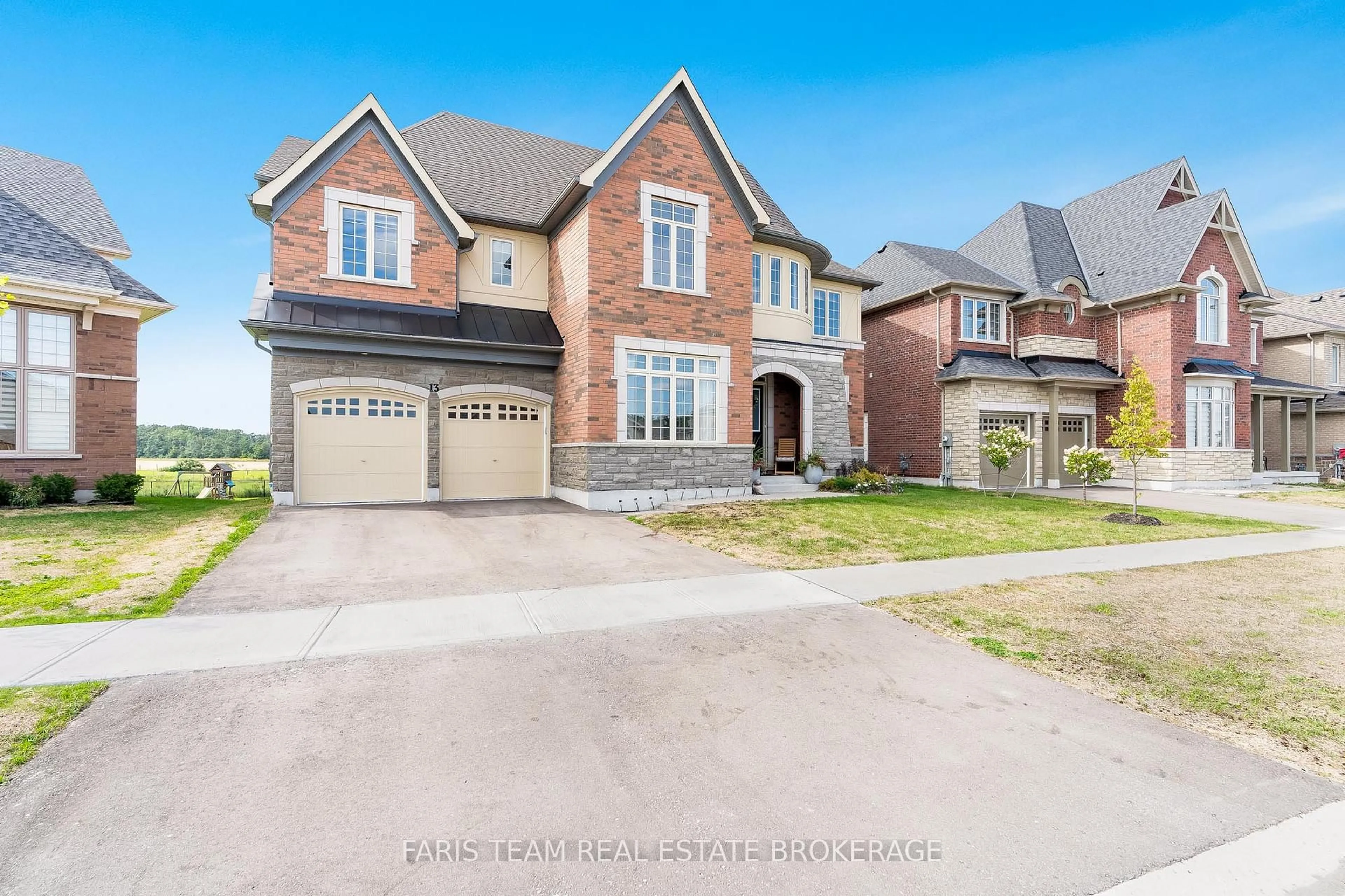 Home with brick exterior material, street for 13 Sanford Circ, Springwater Ontario L9X 2A8