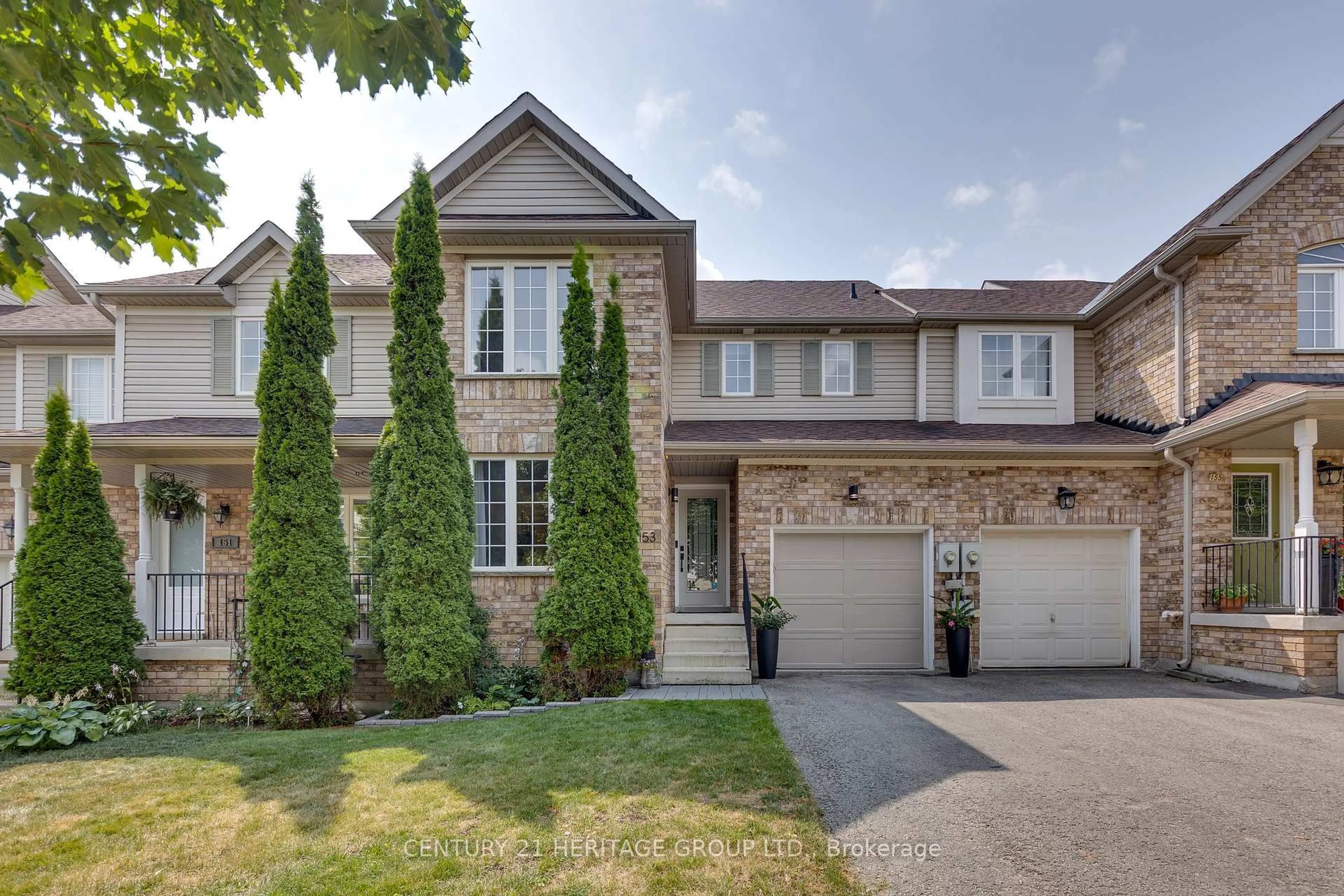 Home with brick exterior material, street for 153 Thrushwood Dr, Barrie Ontario L4N 0Z1