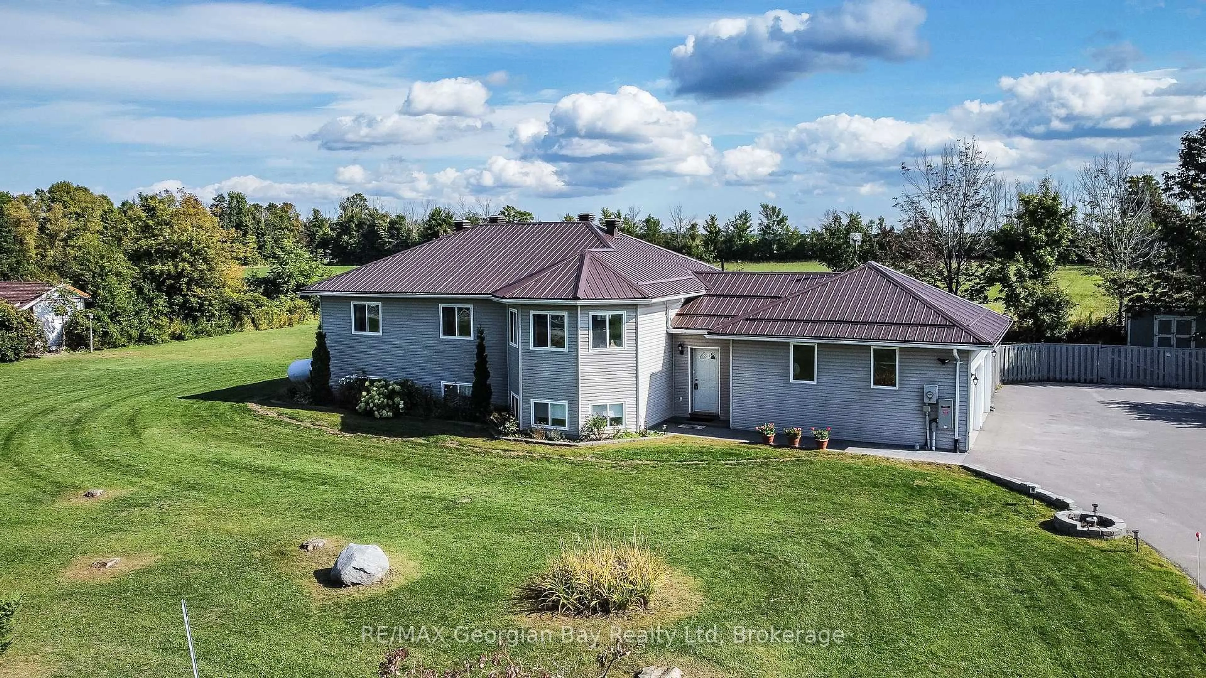 A pic from outside/outdoor area/front of a property/back of a property/a pic from drone, water/lake/river/ocean view for 4989 Vasey Rd, Oro-Medonte Ontario L4R 4K3