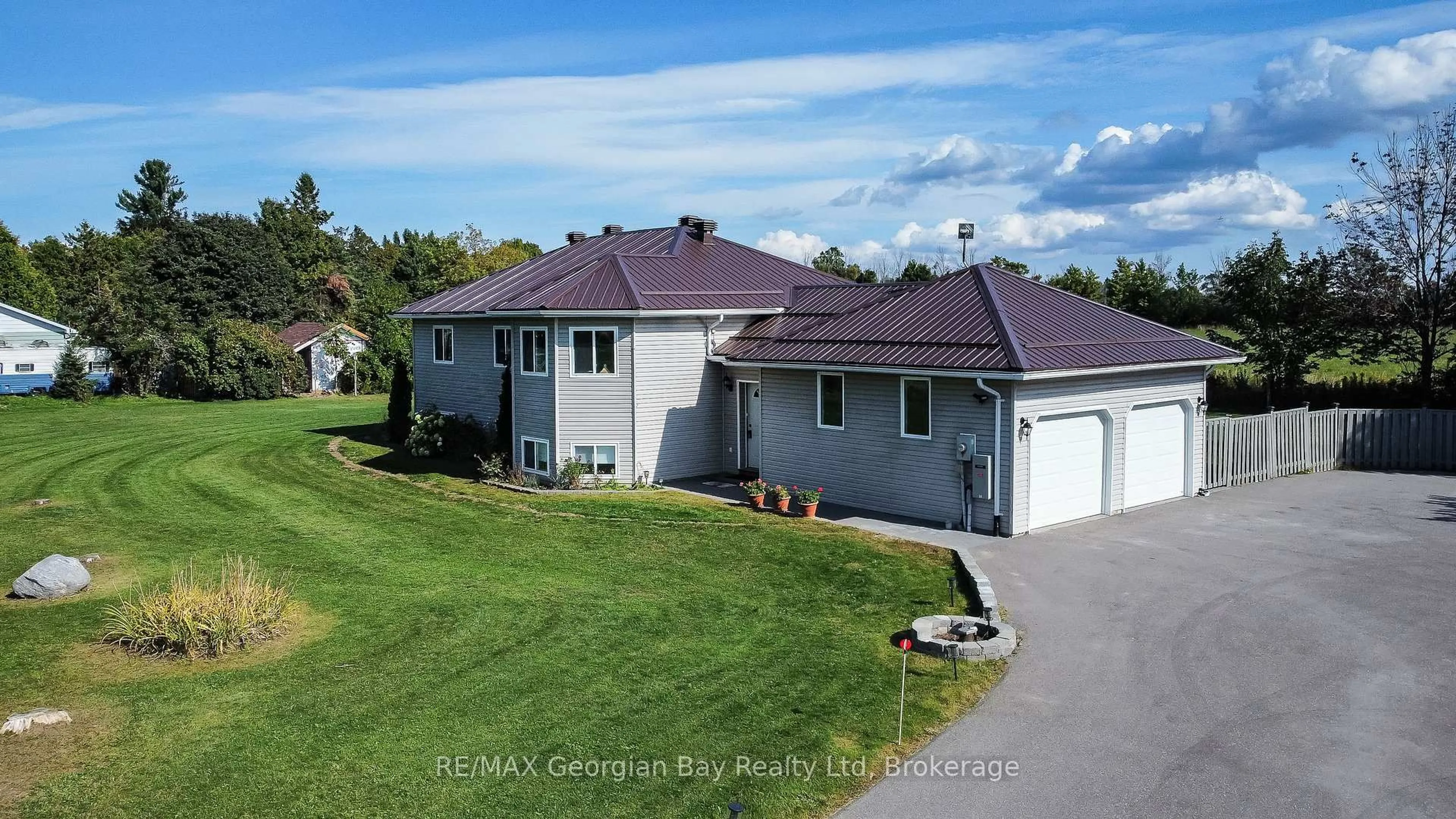 A pic from outside/outdoor area/front of a property/back of a property/a pic from drone, unknown for 4989 Vasey Rd, Oro-Medonte Ontario L4R 4K3