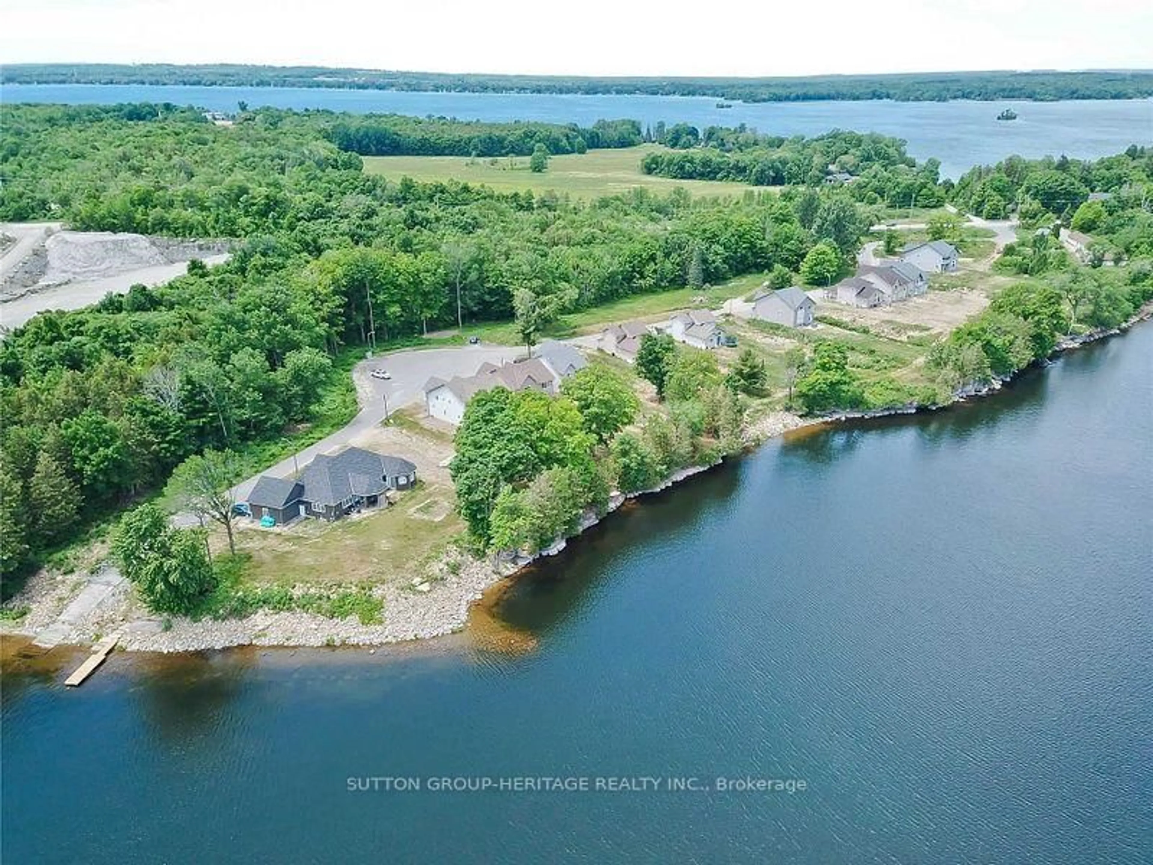 A pic from outside/outdoor area/front of a property/back of a property/a pic from drone, water/lake/river/ocean view for 21 Rosy Beach Crt, Ramara Ontario L3V 8L2