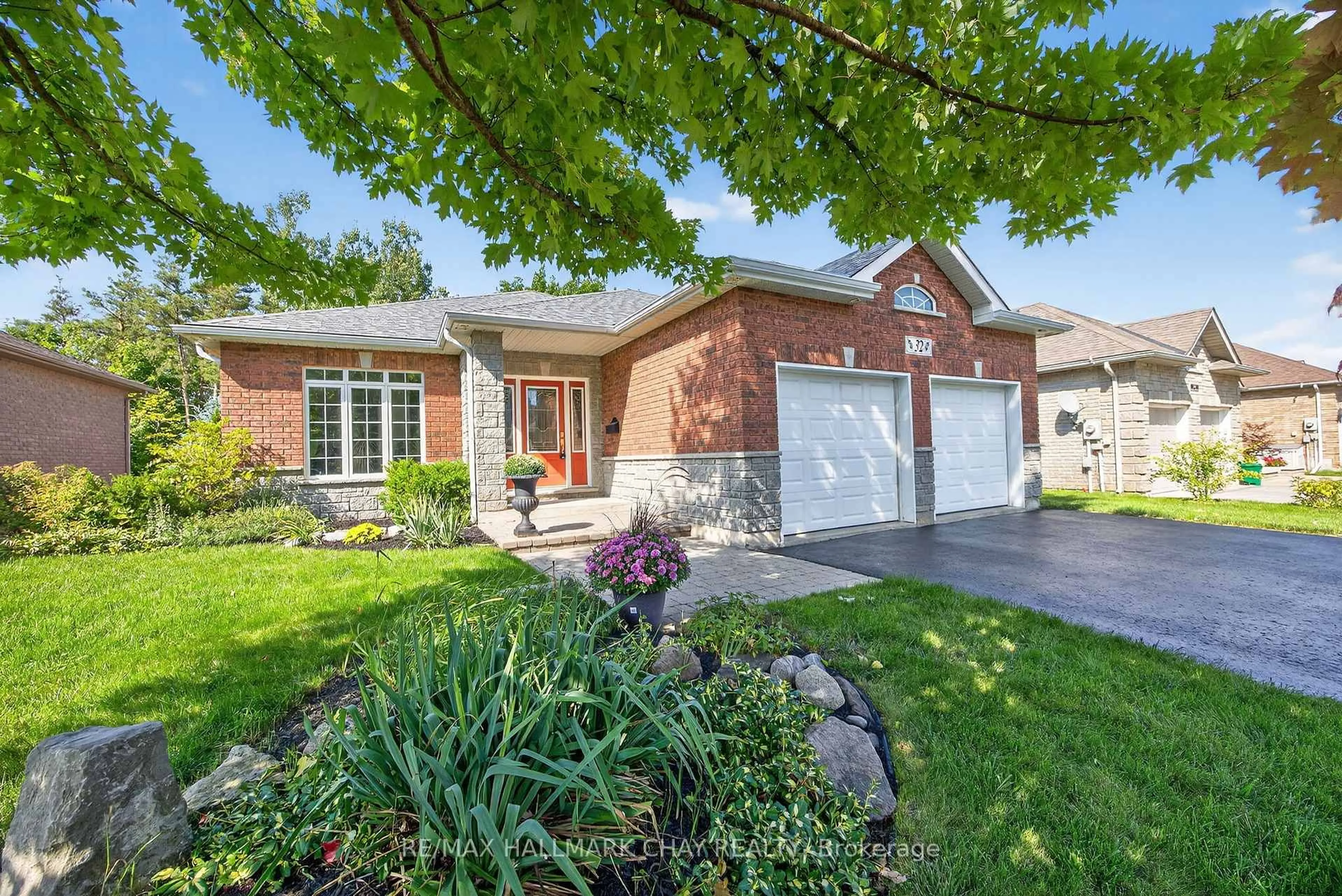 Home with brick exterior material, street for 32 Wildwood Tr, Barrie Ontario L4N 7Z4