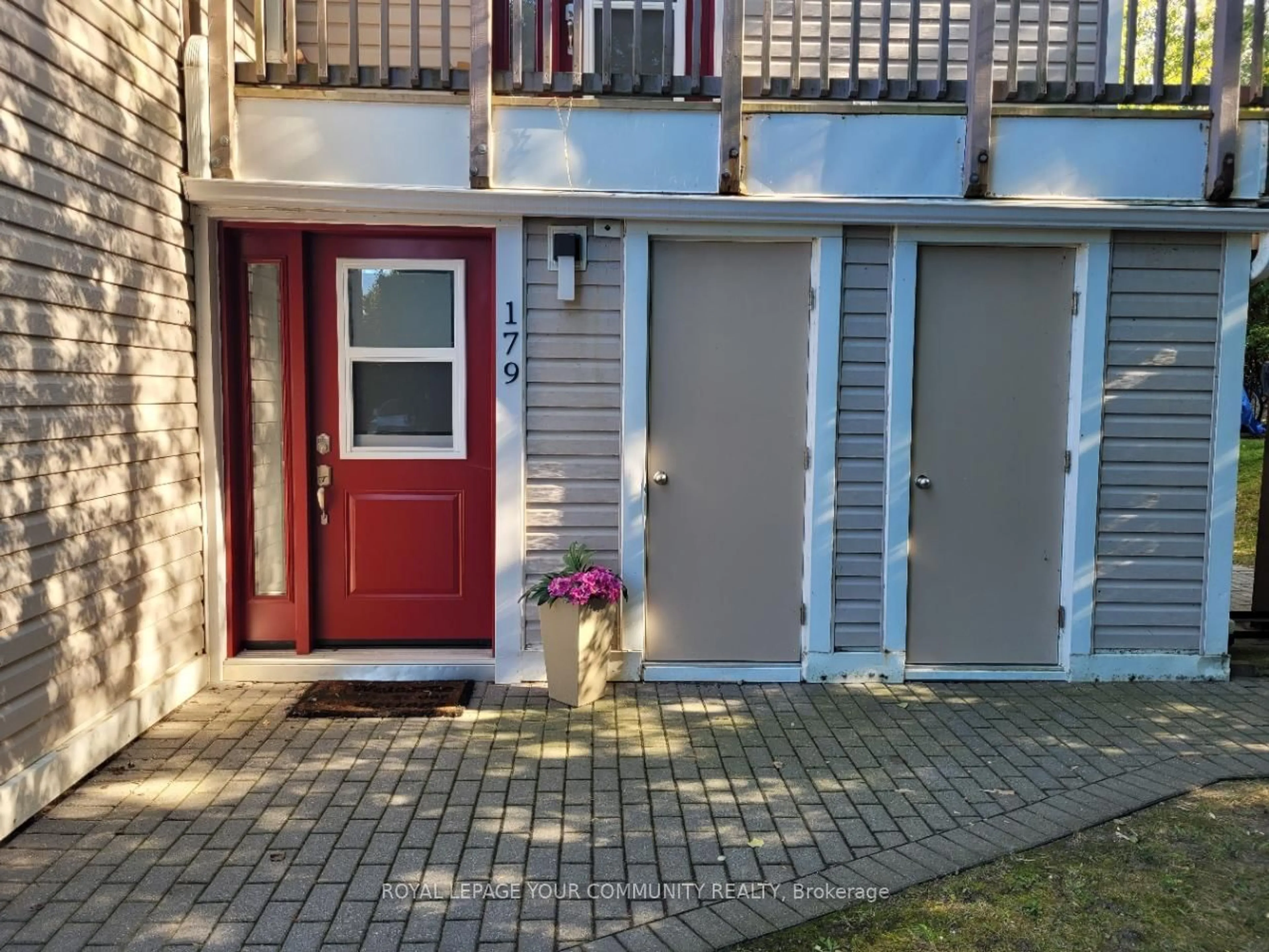A pic from outside/outdoor area/front of a property/back of a property/a pic from drone, street for 49 Trott Blvd #179, Collingwood Ontario L9Y 5B8