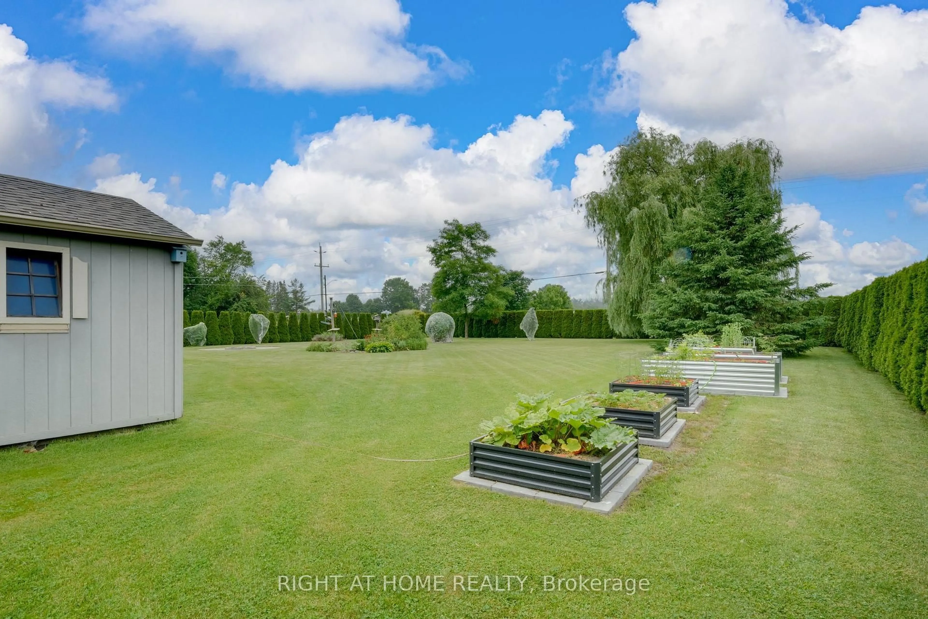 A pic from outside/outdoor area/front of a property/back of a property/a pic from drone, unknown for 16 O'neill Circ, Springwater Ontario L2L 2K0