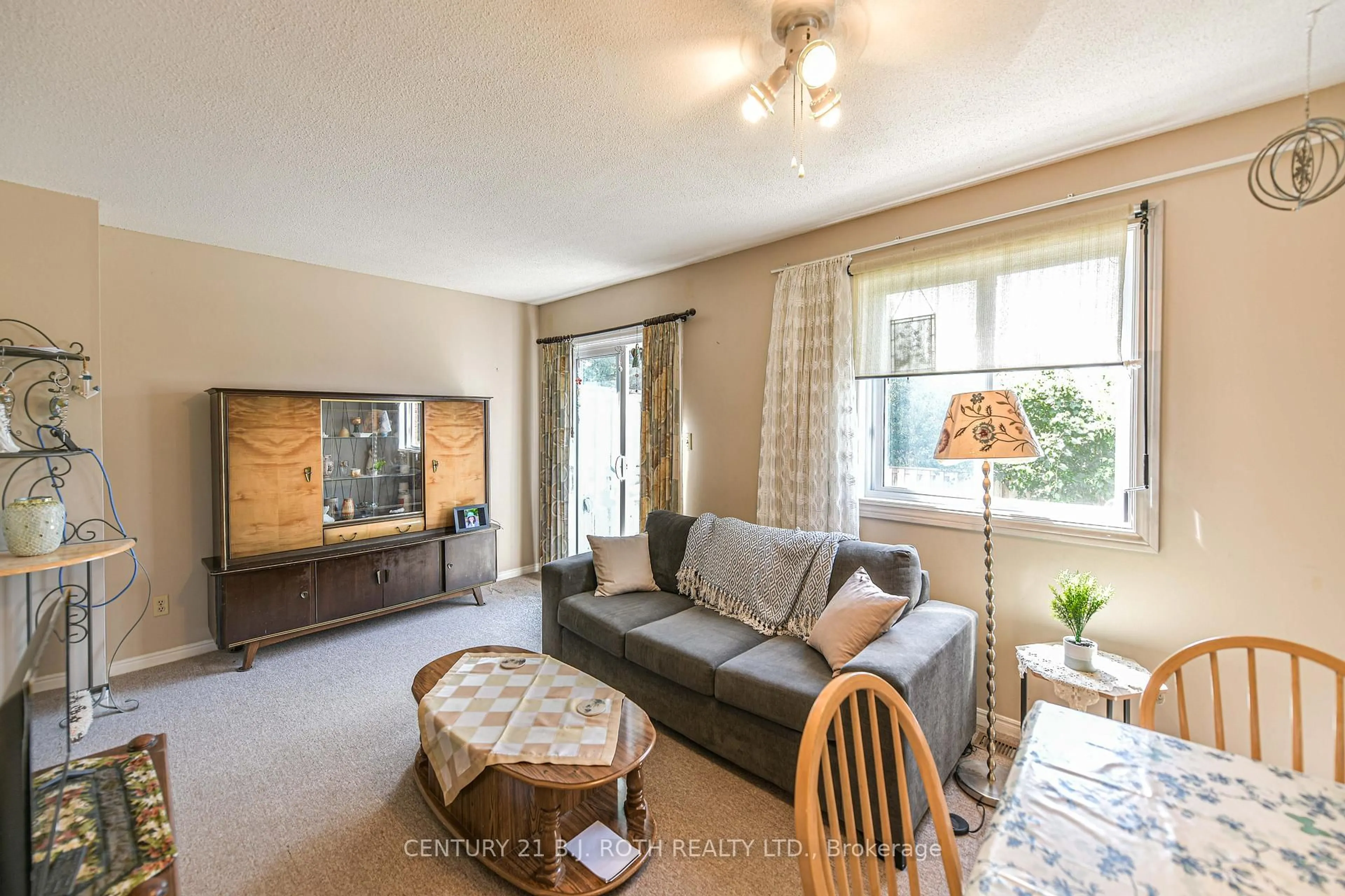 Living room with furniture, unknown for 25 South St #106, Orillia Ontario L3V 7M7