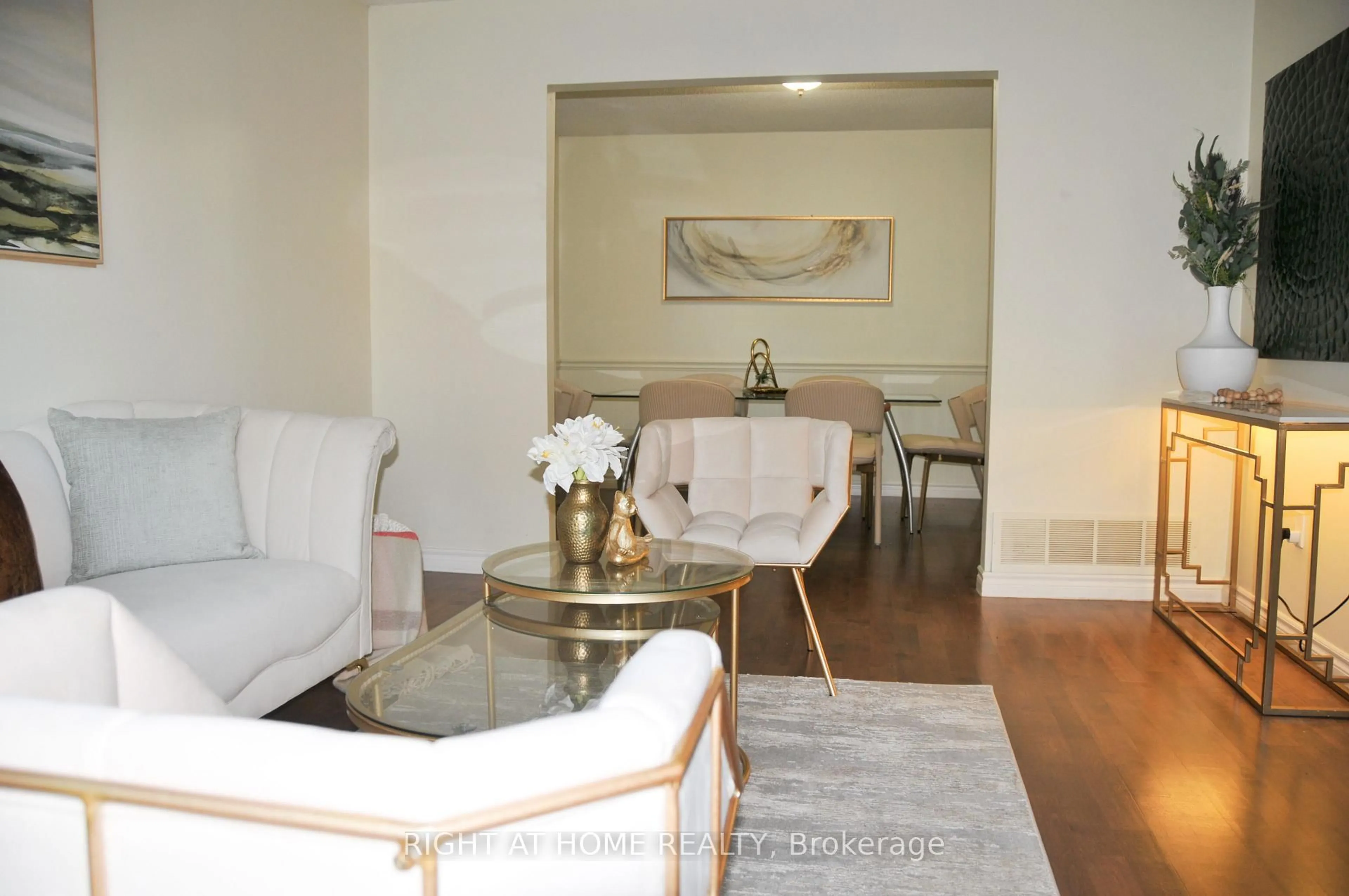Living room with furniture, wood/laminate floor for 29 Herrell Ave, Barrie Ontario L4N 6T5