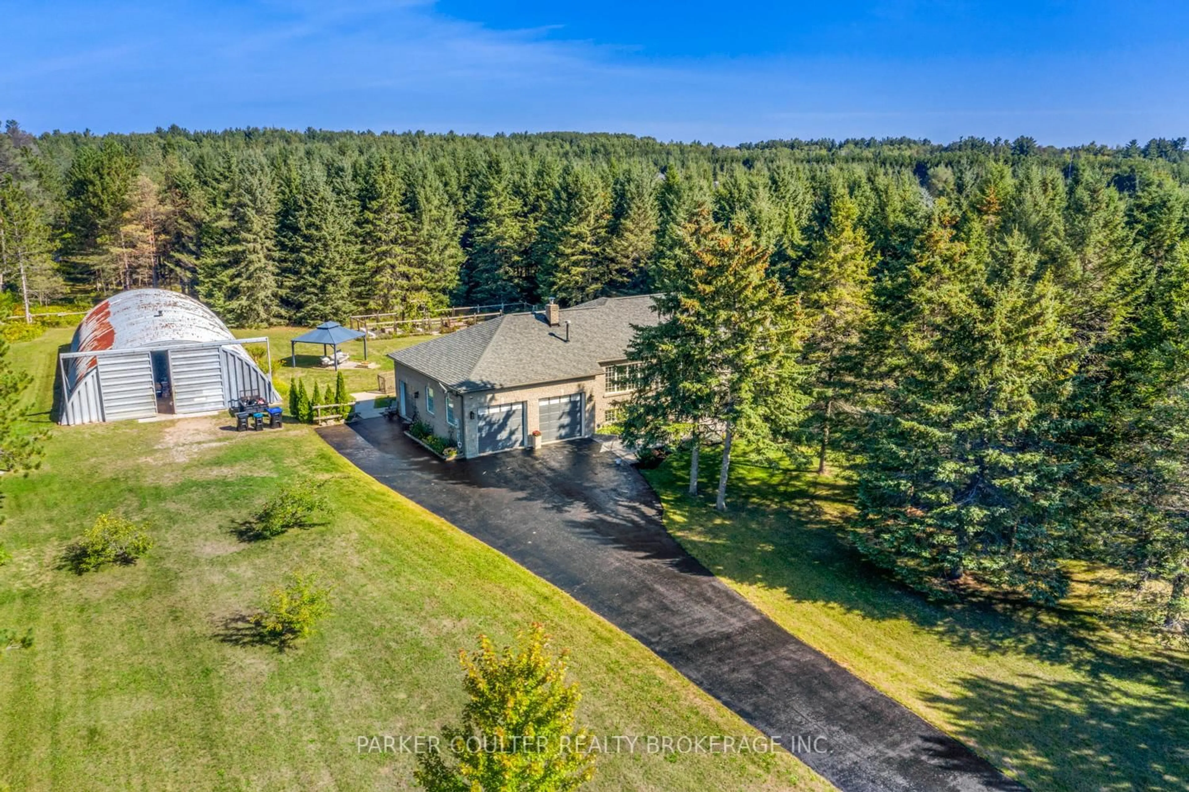 A pic from outside/outdoor area/front of a property/back of a property/a pic from drone, forest/trees view for 5830 Sunnidale/tosorontio Townline, Clearview Ontario L0M 1N0