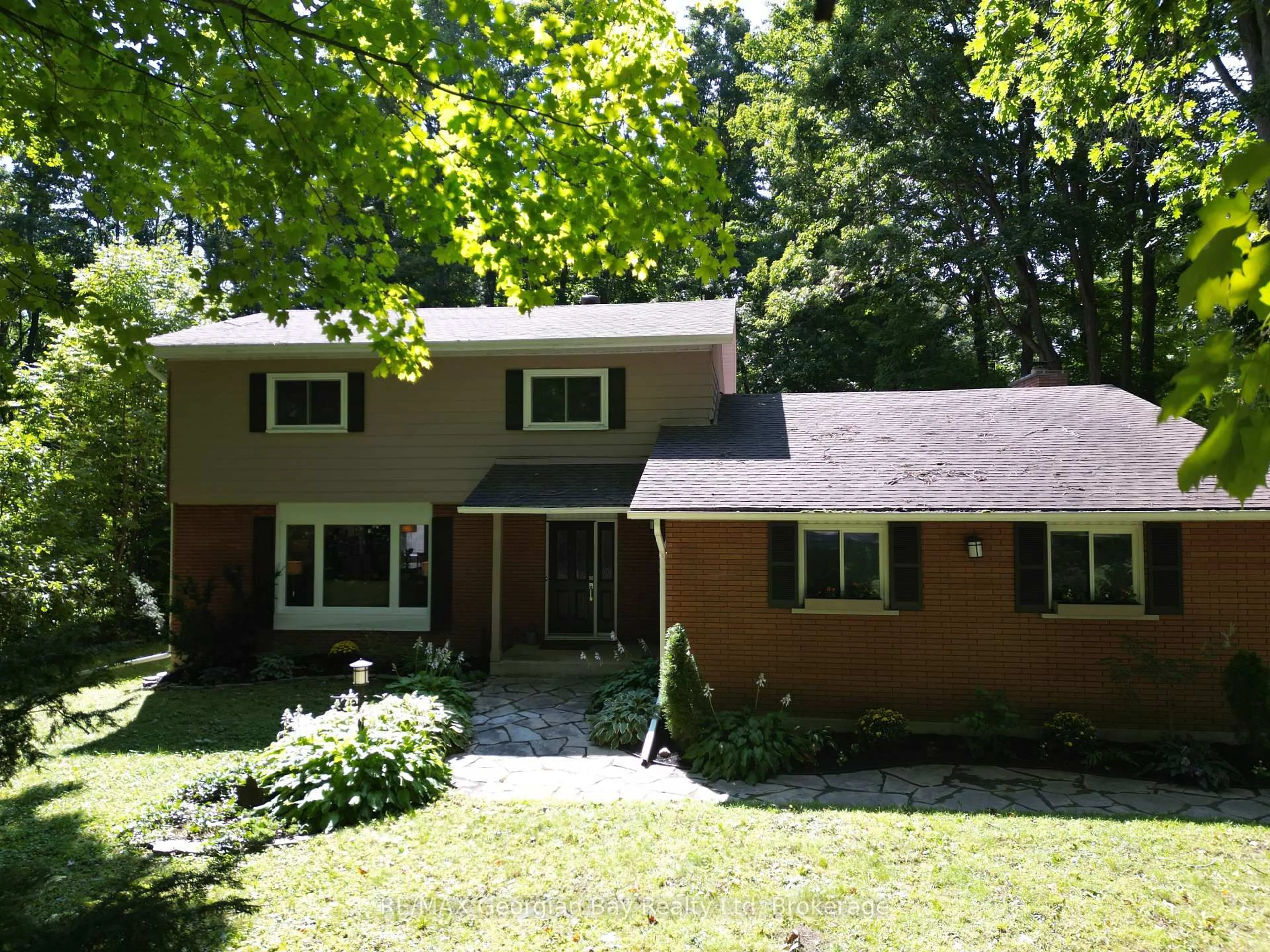 Home with brick exterior material, street for 849 Midland Point Rd, Midland Ontario L4R 5G1