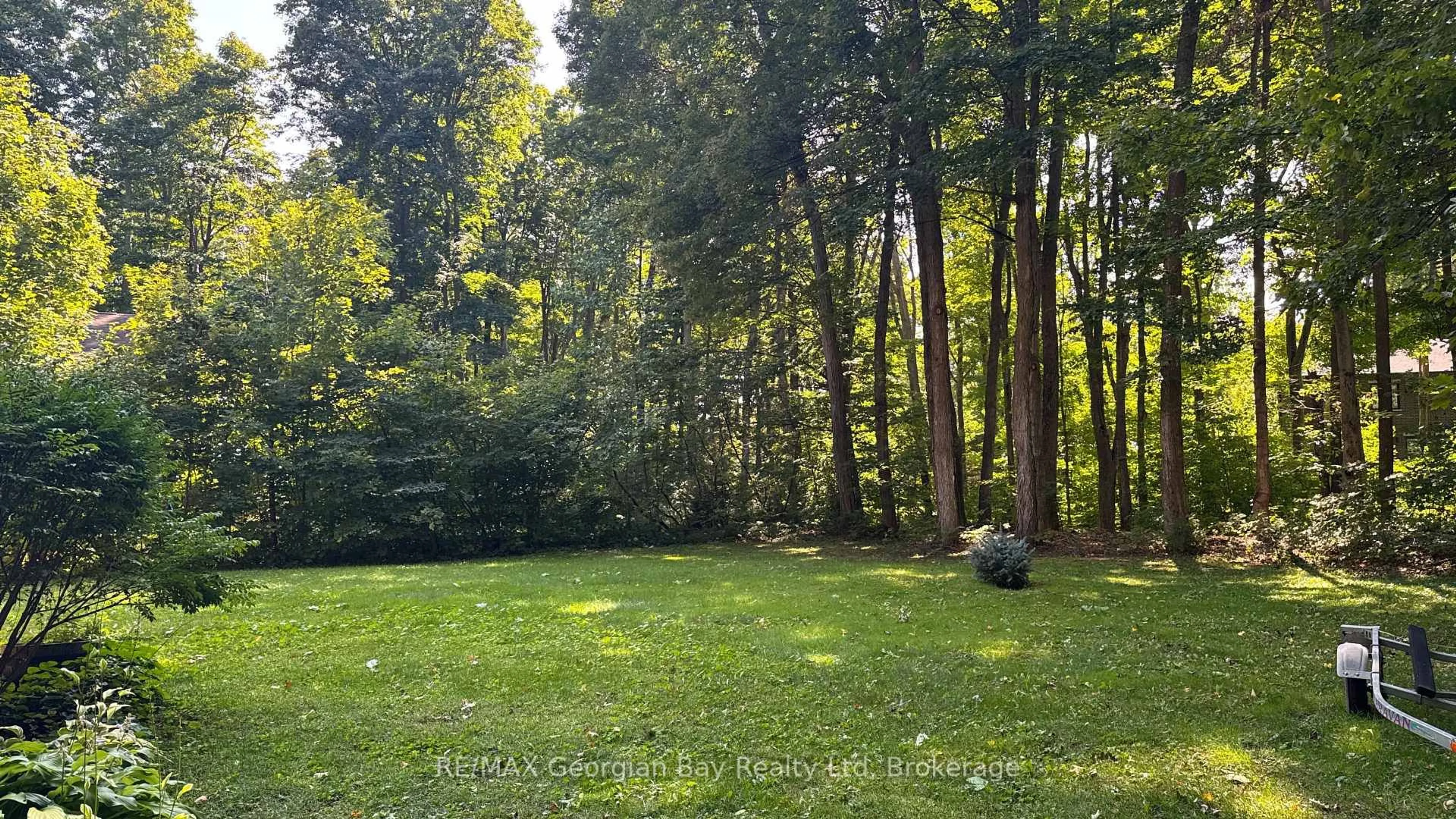 A pic from outside/outdoor area/front of a property/back of a property/a pic from drone, forest/trees view for 849 Midland Point Rd, Midland Ontario L4R 5G1