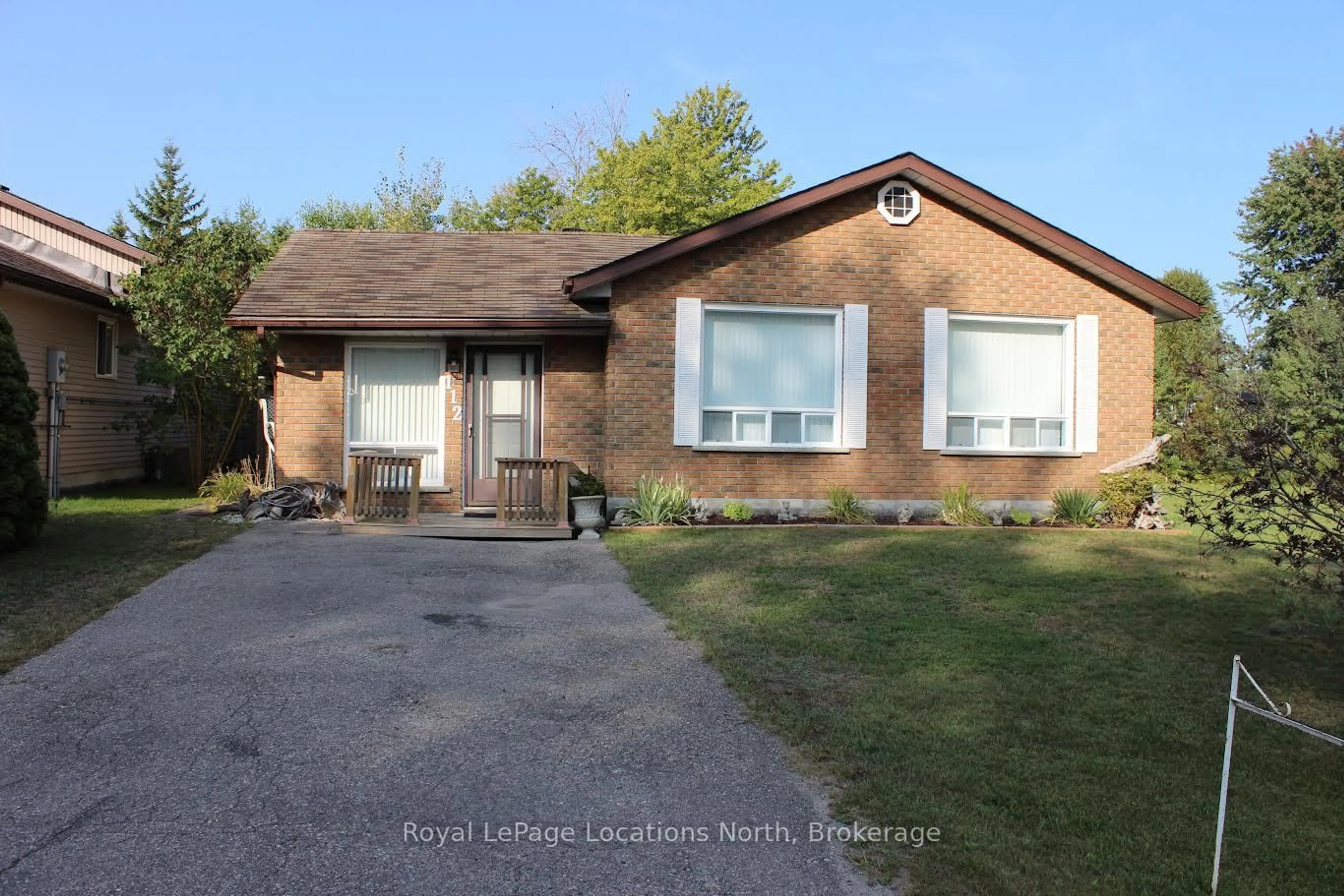 Home with brick exterior material, street for 112 Smallman Dr, Wasaga Beach Ontario L9Z 1L3