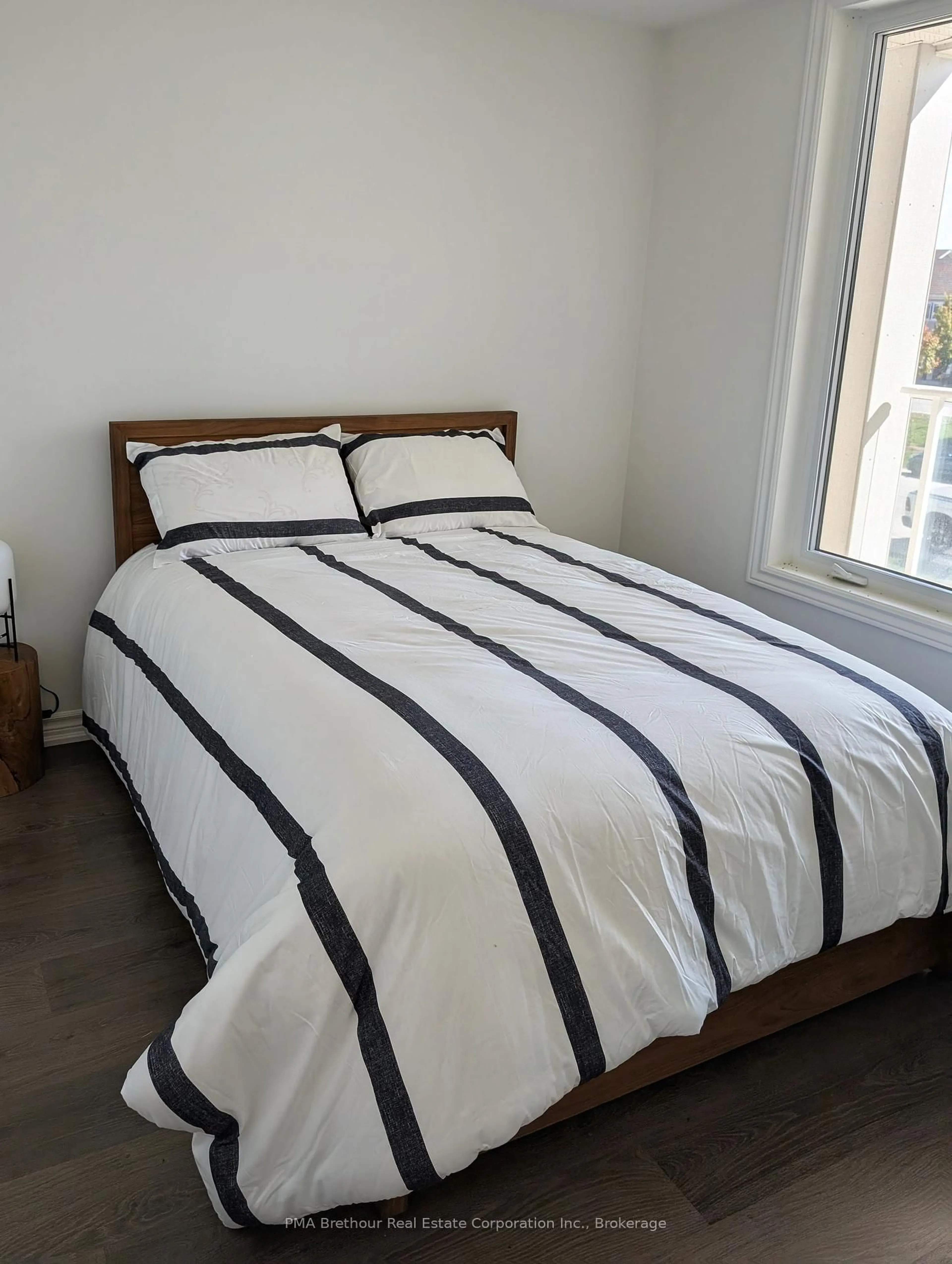 Bedroom with bed, unknown for 17 Spooner Cres #202, Collingwood Ontario L9Y 1T9