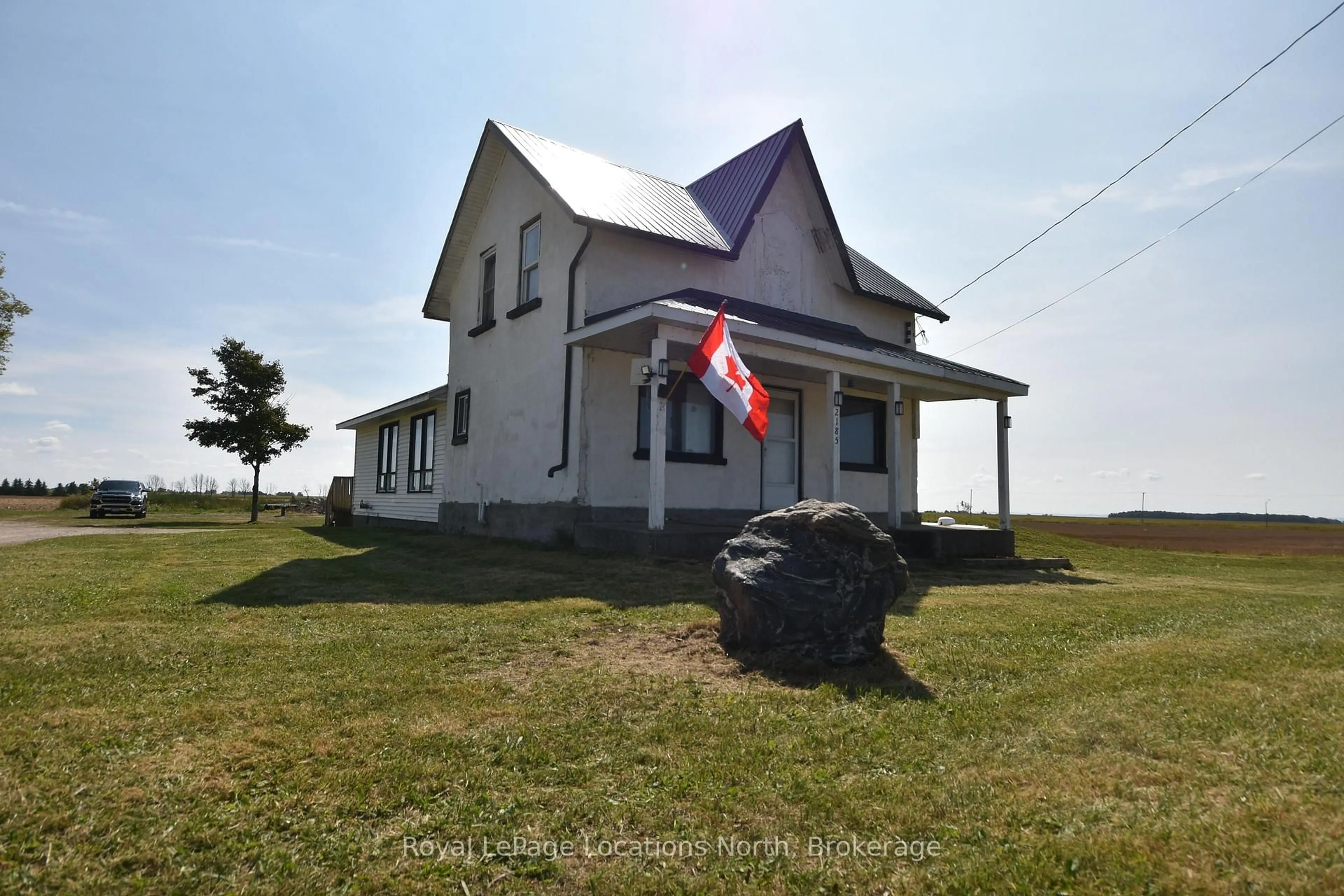A pic from outside/outdoor area/front of a property/back of a property/a pic from drone, building for 2185 county road 92 Rd, Springwater Ontario L0L 1P0