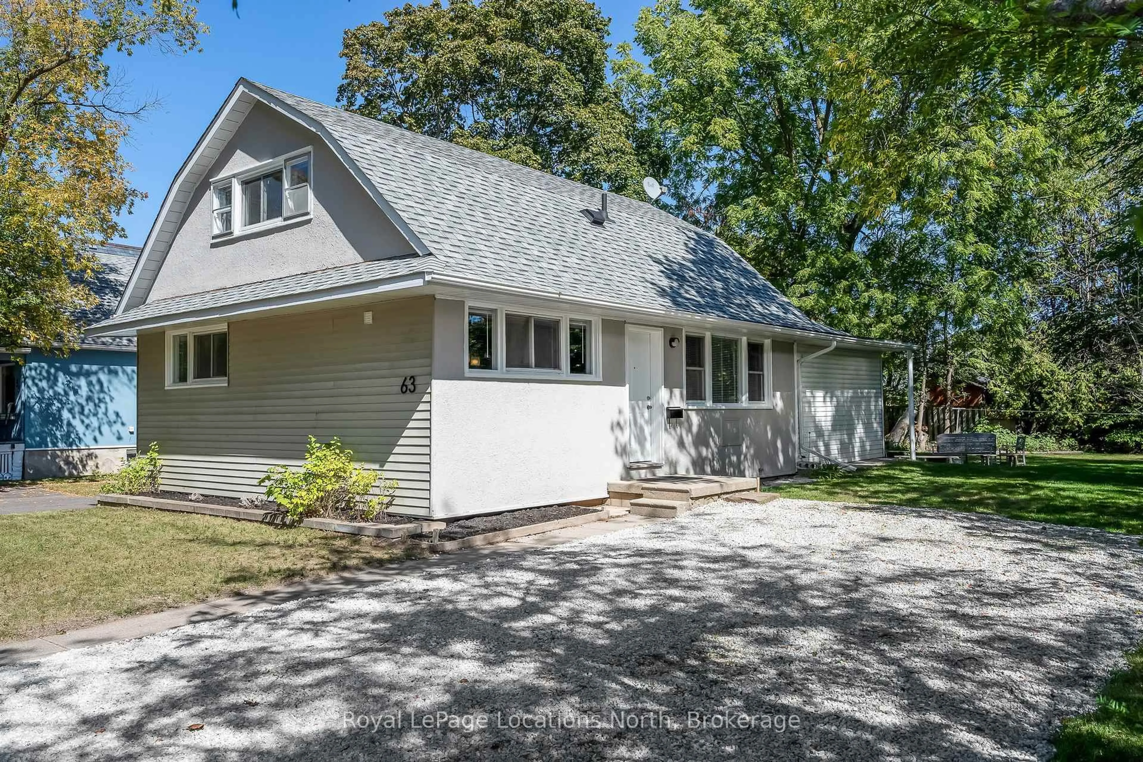 Home with vinyl exterior material, street for 63 Maple St, Collingwood Ontario L9Y 2P7