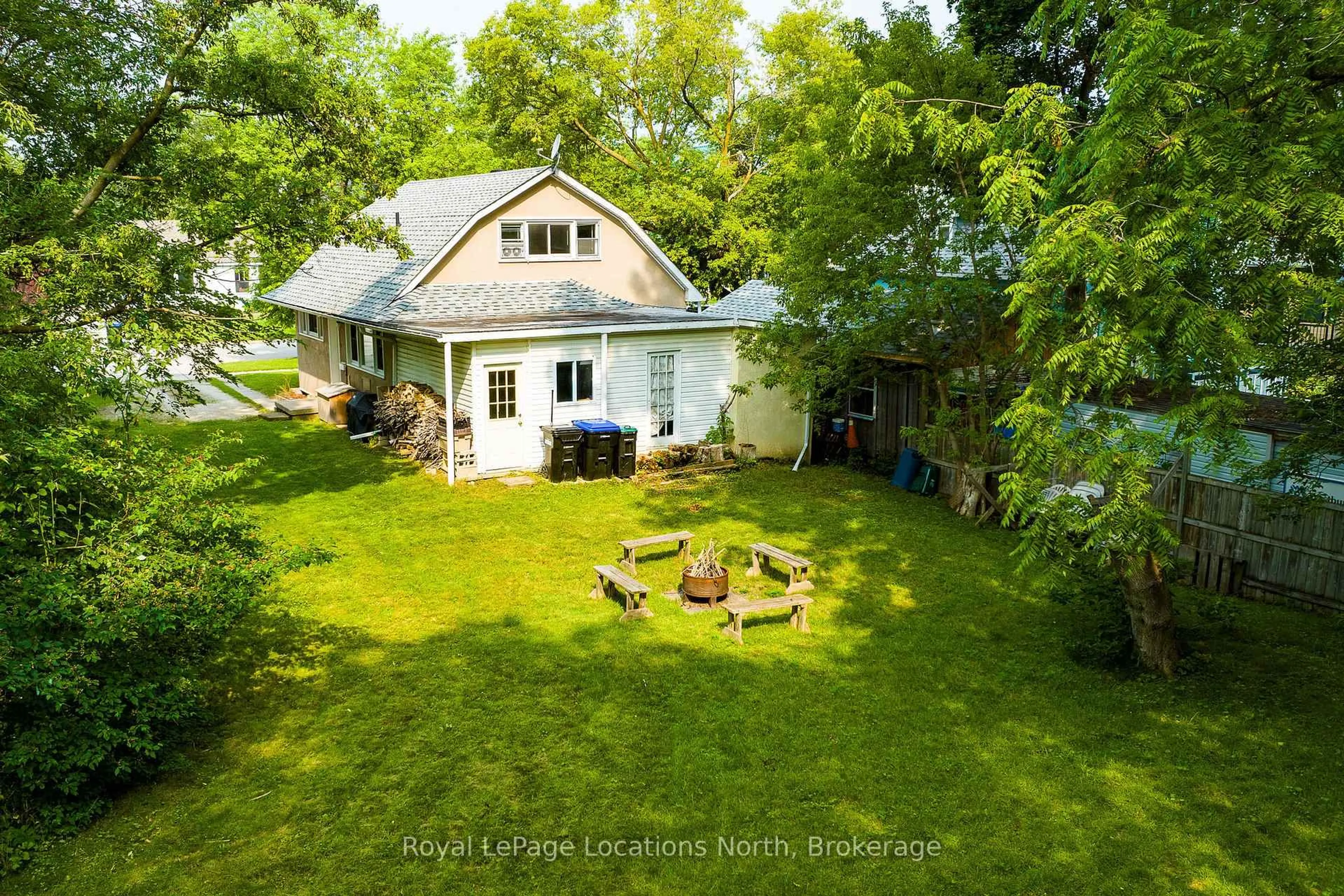 A pic from outside/outdoor area/front of a property/back of a property/a pic from drone, water/lake/river/ocean view for 63 Maple St, Collingwood Ontario L9Y 2P7