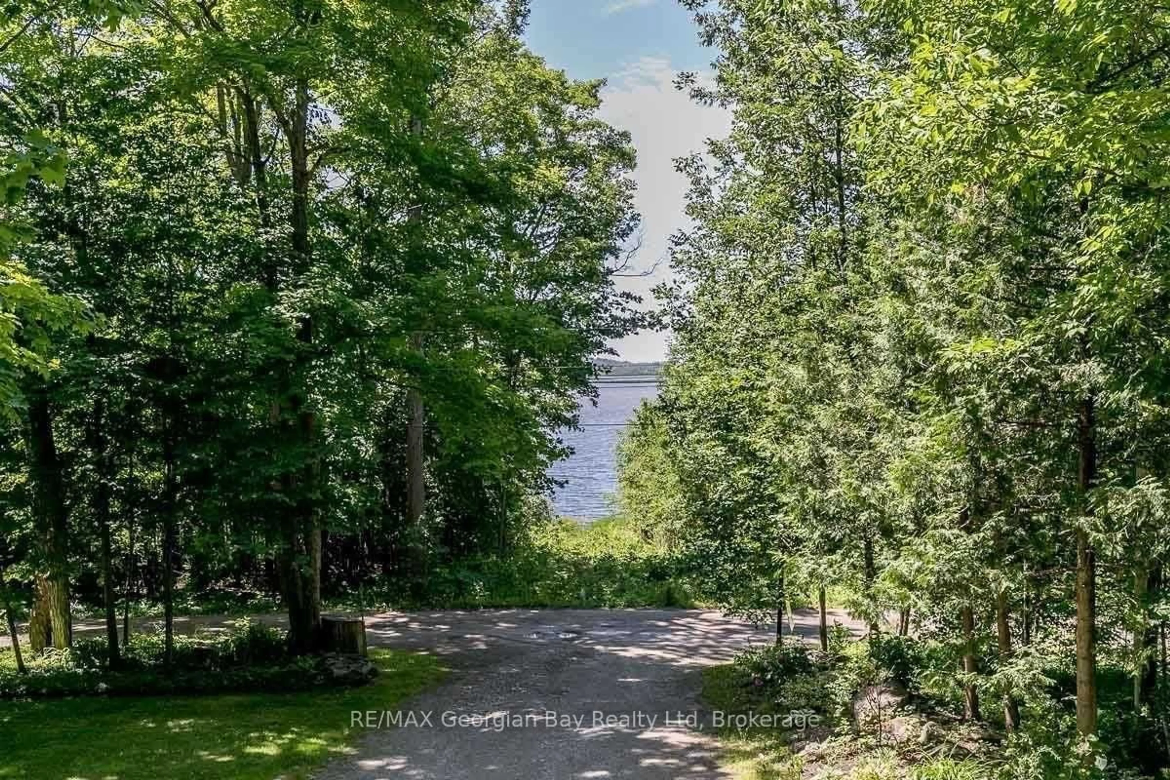 A pic from outside/outdoor area/front of a property/back of a property/a pic from drone, forest/trees view for 1745 Twin Oaks Cres, Severn Ontario L0K 1E0
