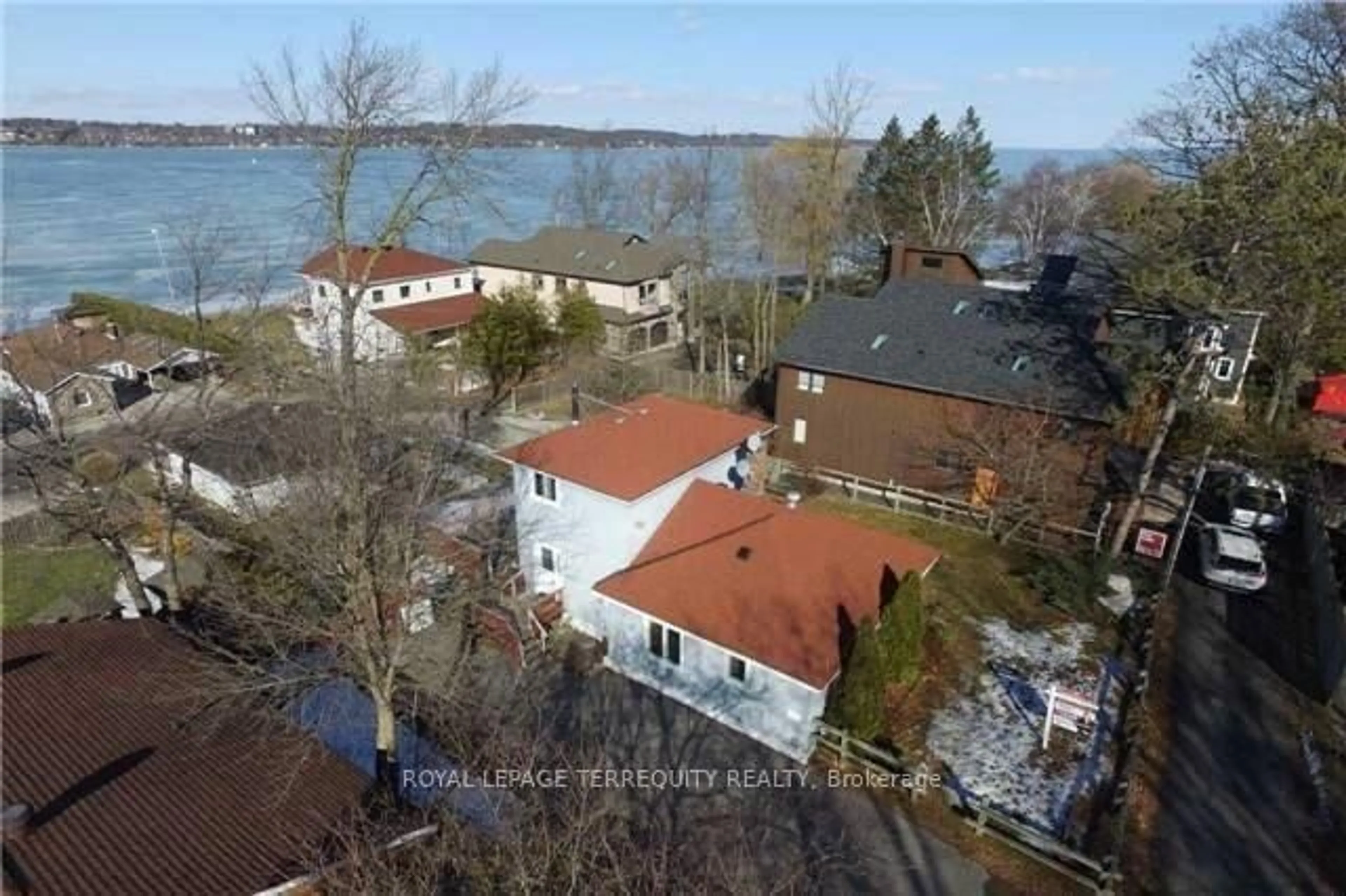 A pic from outside/outdoor area/front of a property/back of a property/a pic from drone, water/lake/river/ocean view for 40 Brennan Ave, Barrie Ontario L4N 3X3