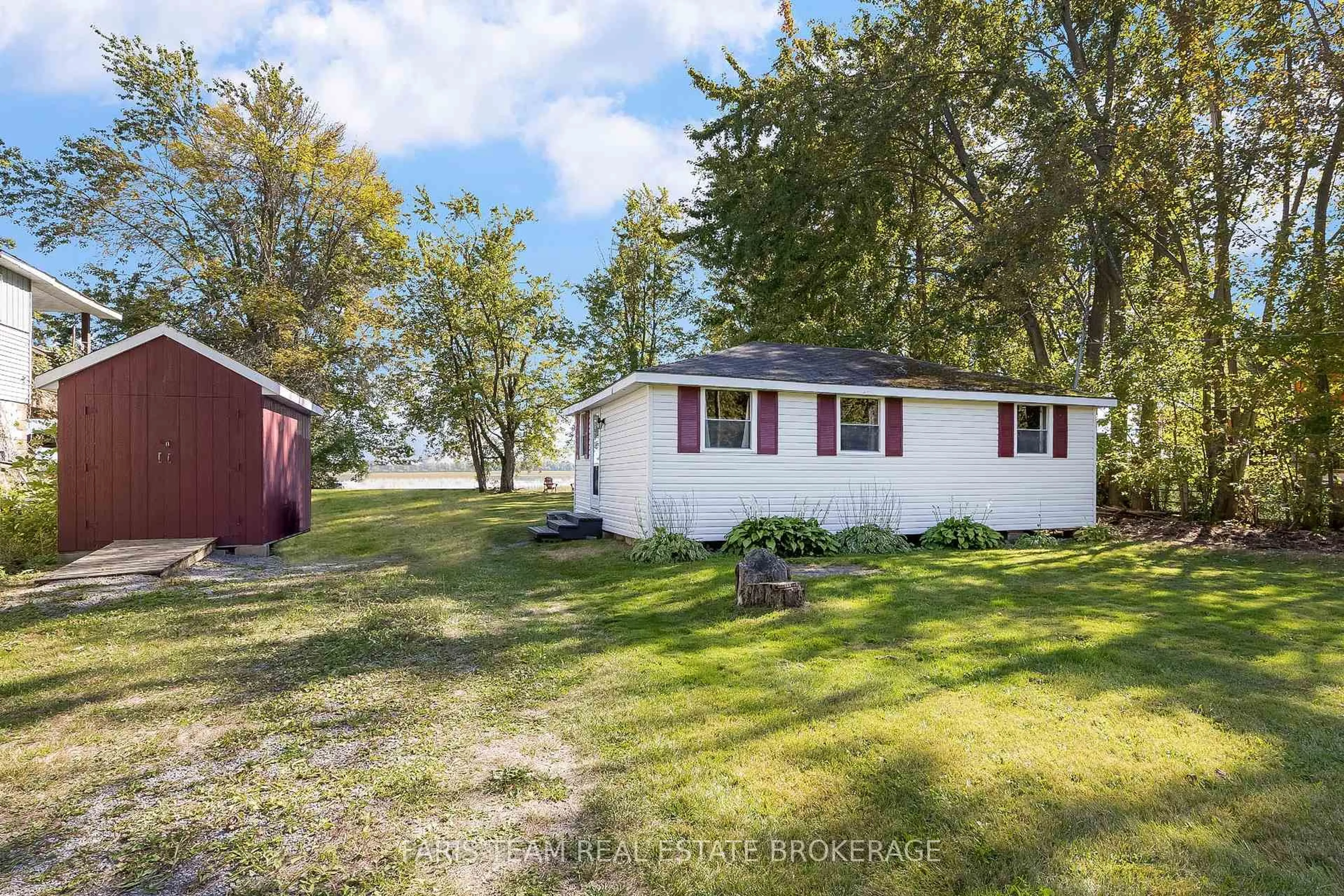 A pic from outside/outdoor area/front of a property/back of a property/a pic from drone, water/lake/river/ocean view for 1313 Carol Ann Ave, Ramara Ontario L0K 1B0