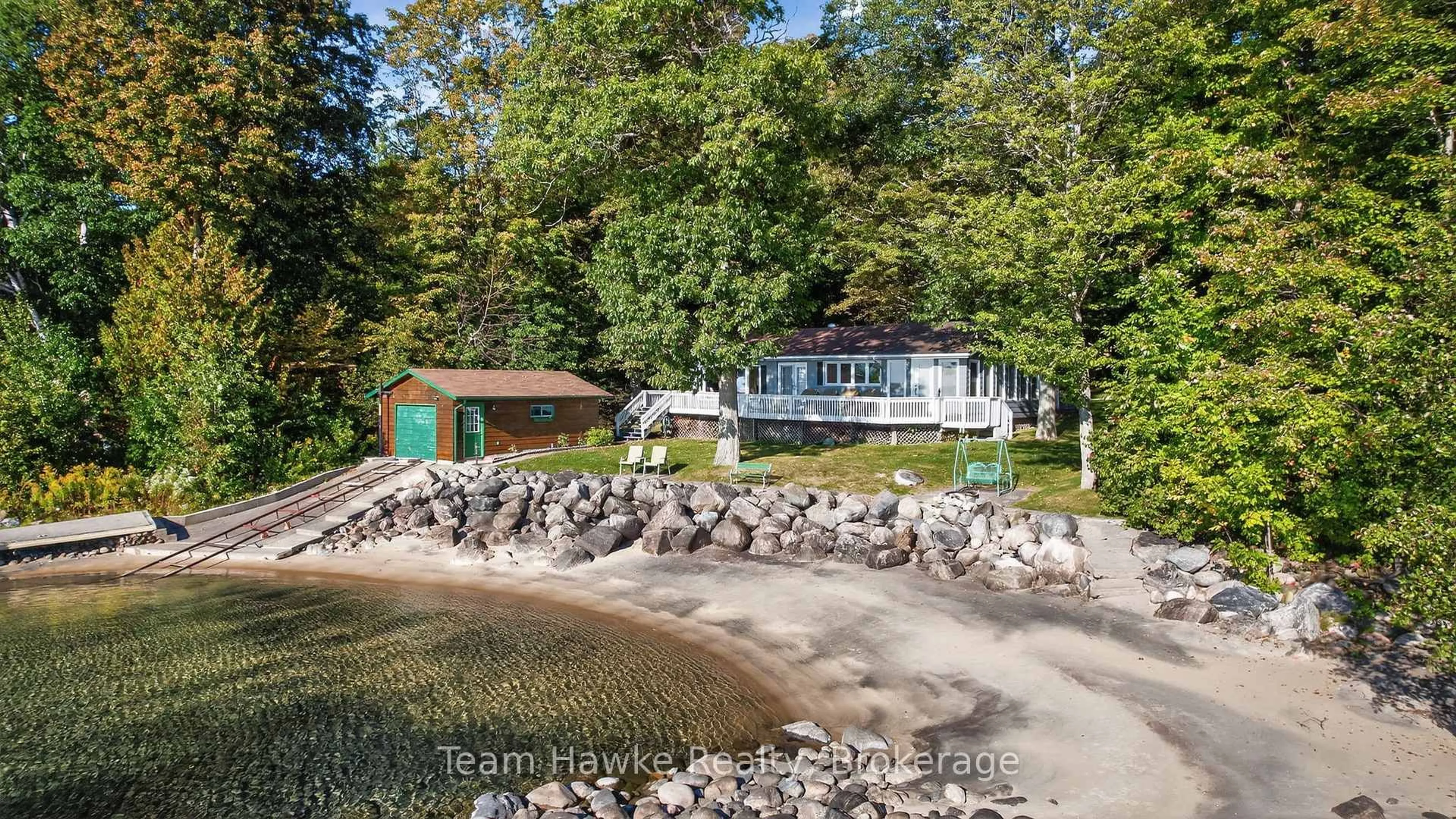 A pic from outside/outdoor area/front of a property/back of a property/a pic from drone, water/lake/river/ocean view for 2082 Tiny Beaches Rd, Tiny Ontario L9M 0H6