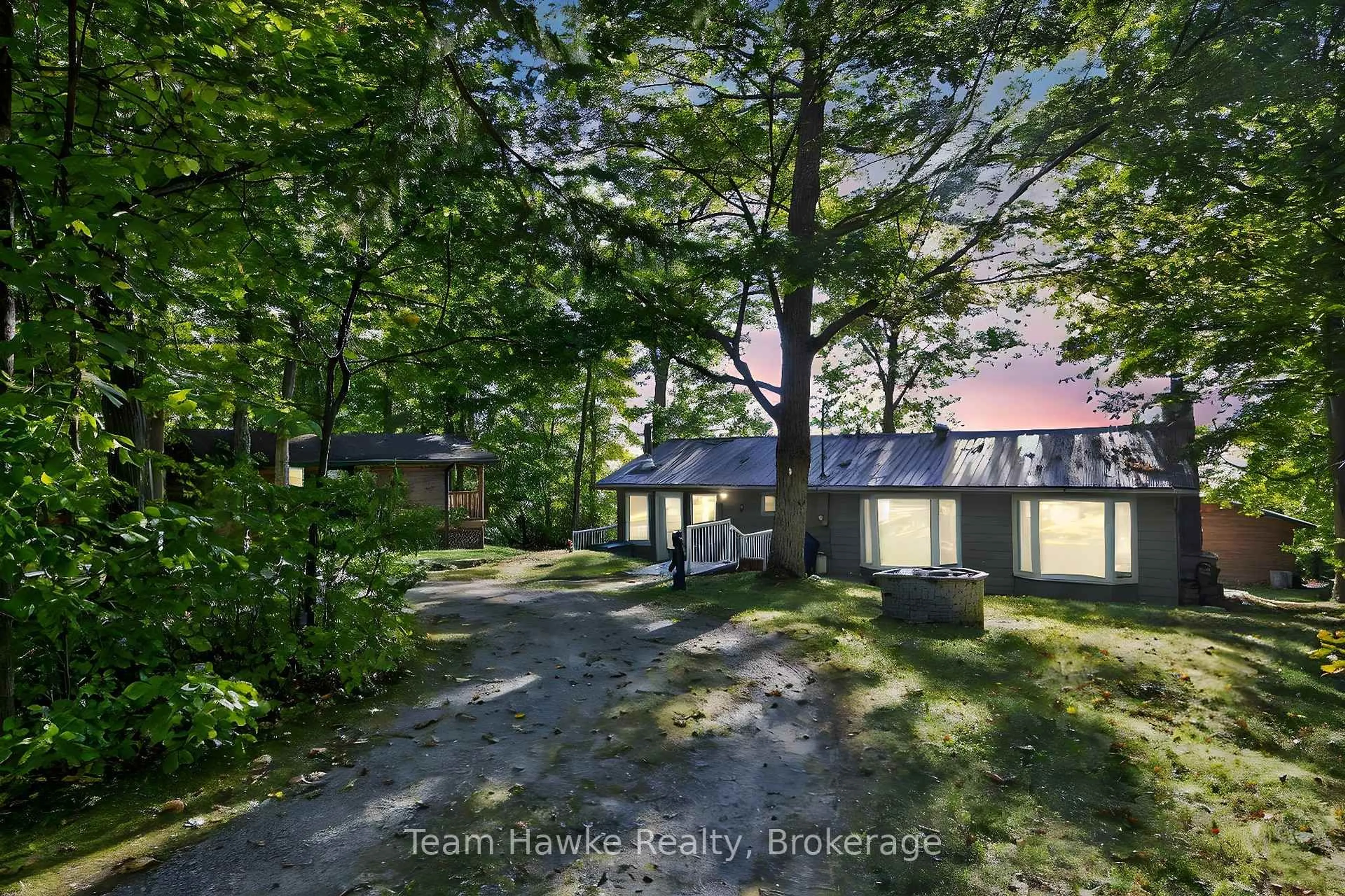 A pic from outside/outdoor area/front of a property/back of a property/a pic from drone, forest/trees view for 2082 Tiny Beaches Rd, Tiny Ontario L9M 0H6